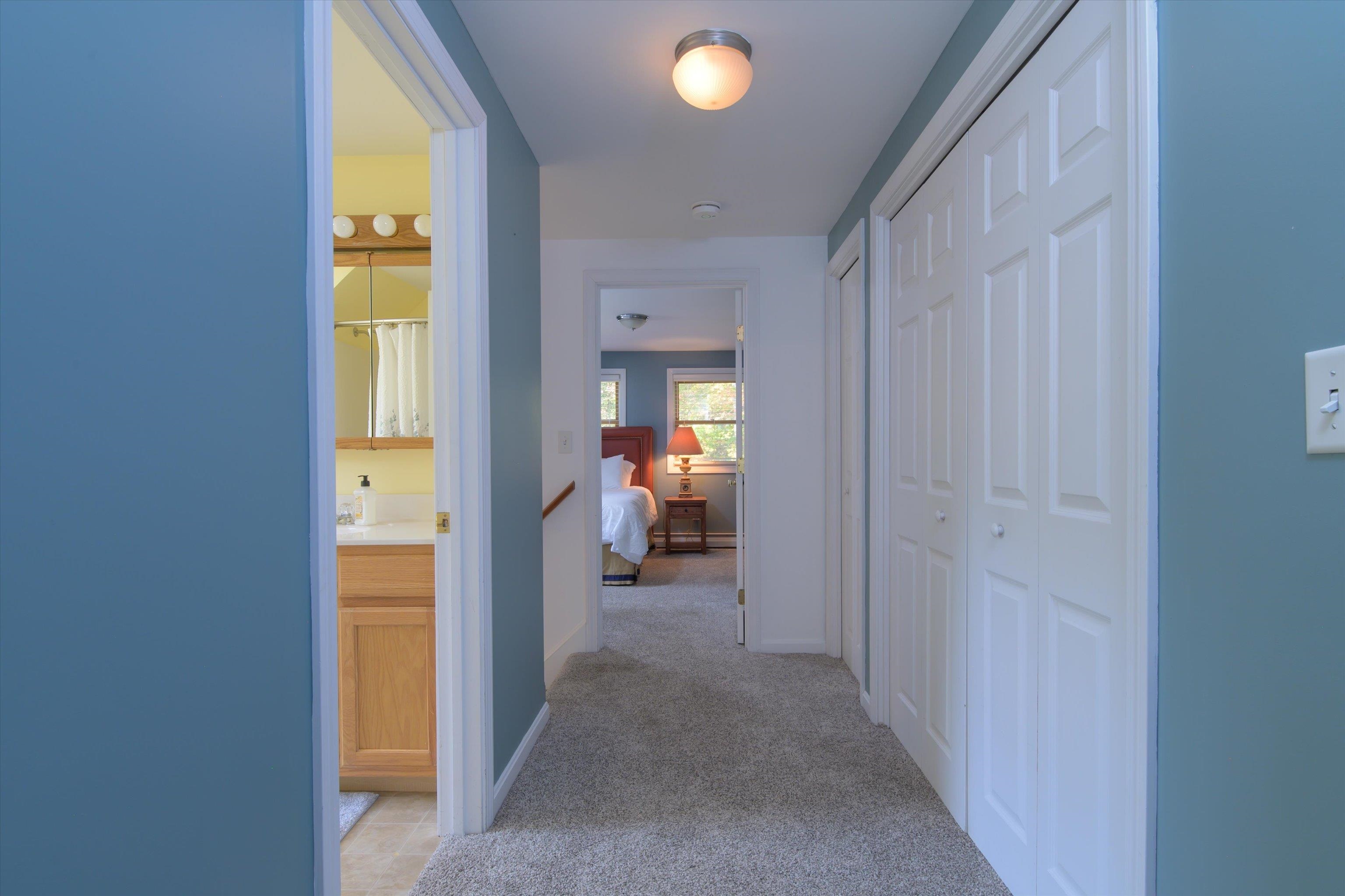 Hall on Upper Level with Laundry on Right
