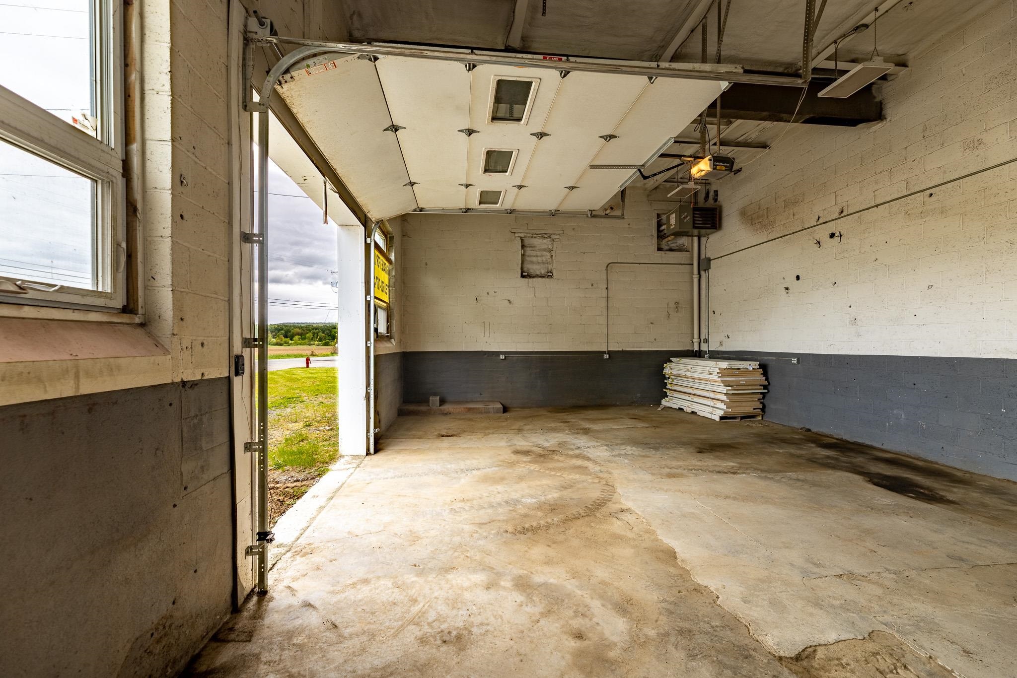 Part of 3-bay mechanics garage