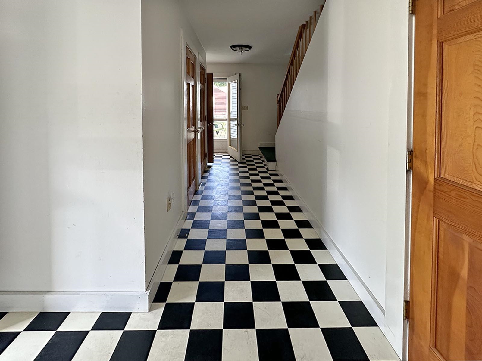 Hall to 3rd bath, deck and kitchen 21962957