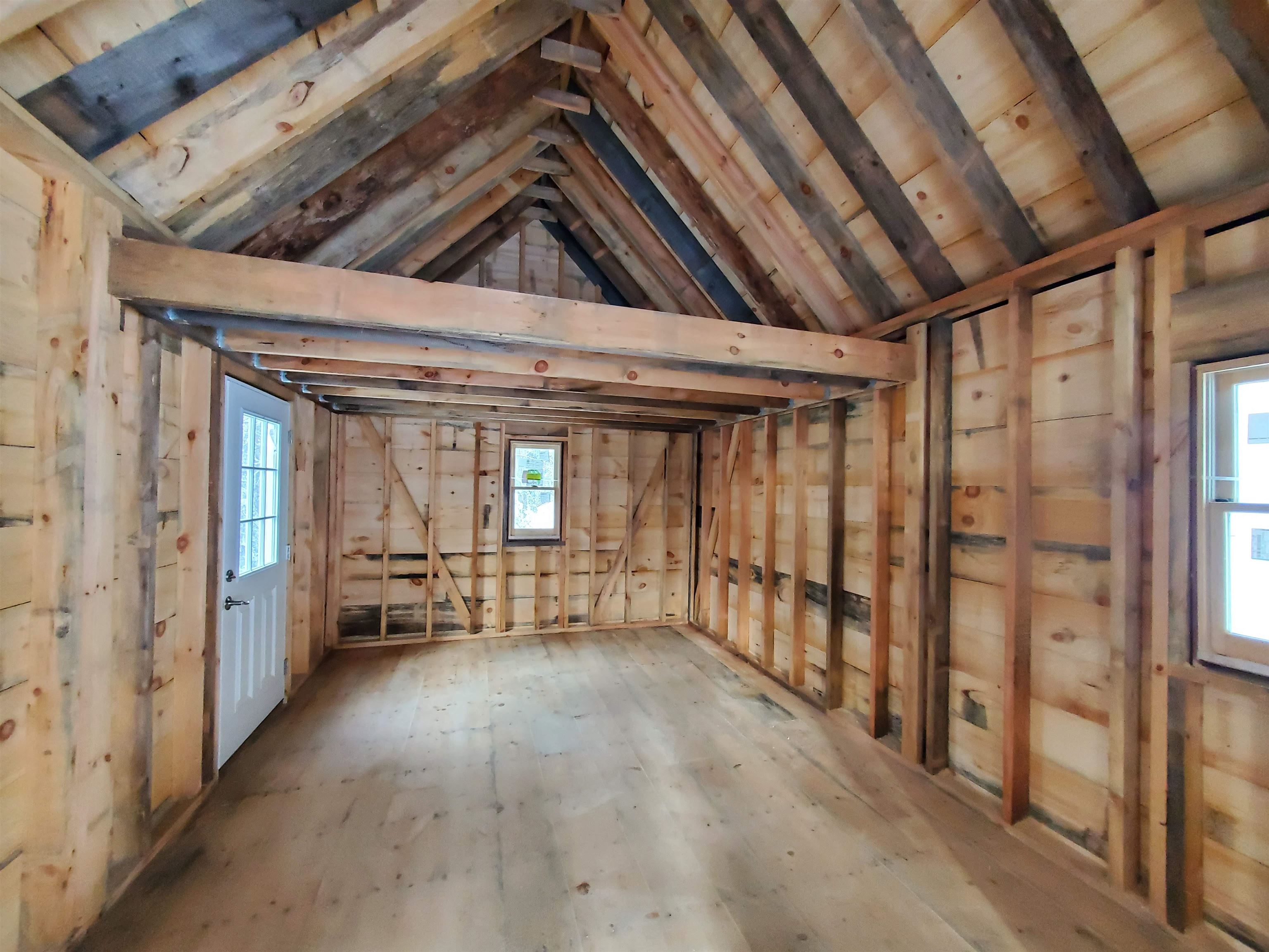 Unfinished interior with loft