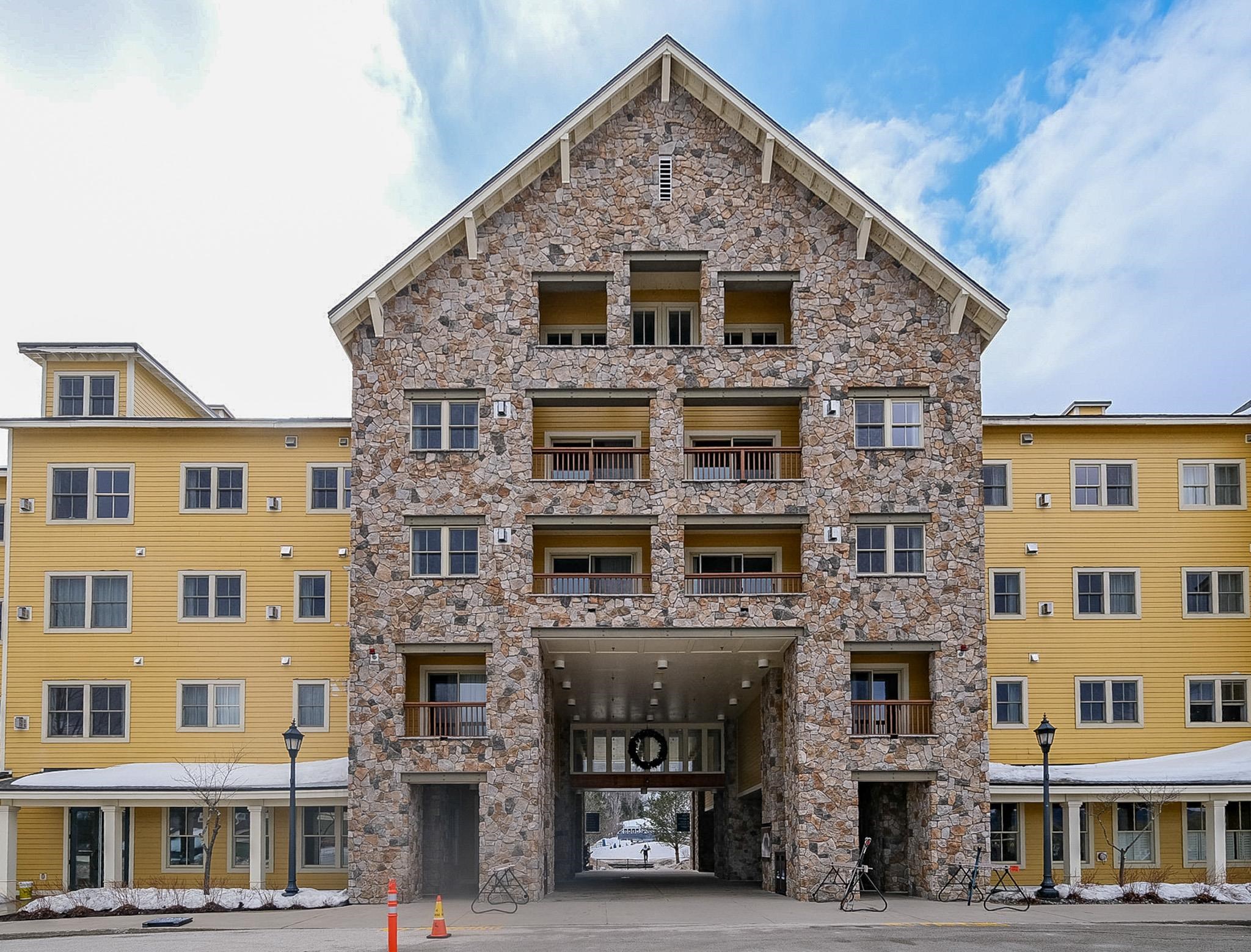 Located with a balcony in the stone facade 22804964