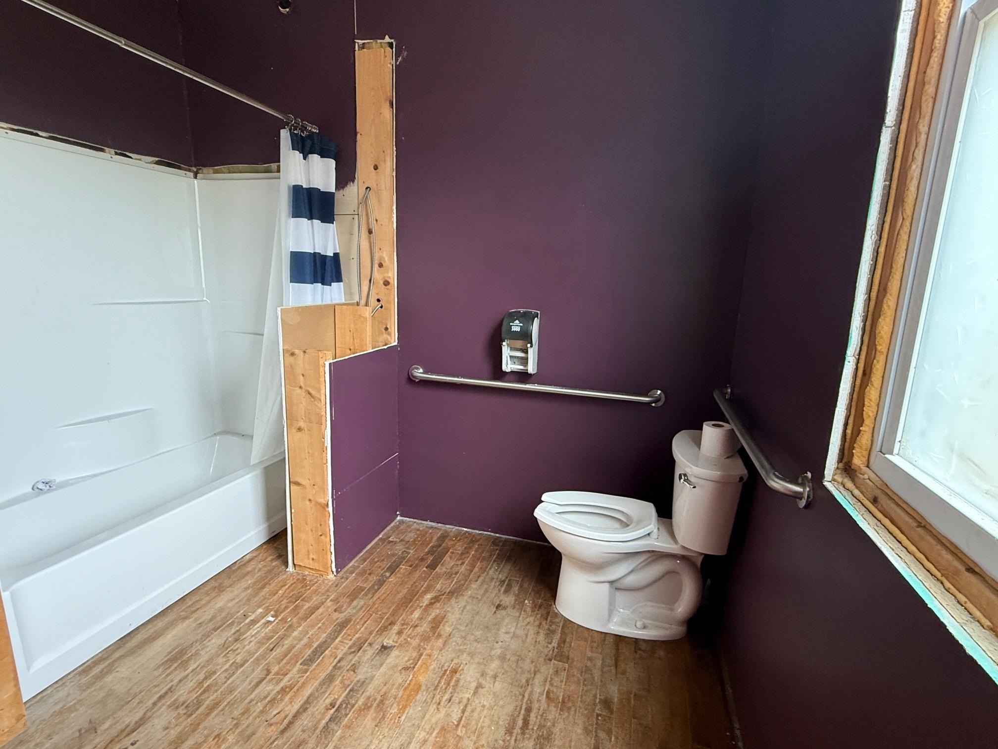 Full bath with tub shower