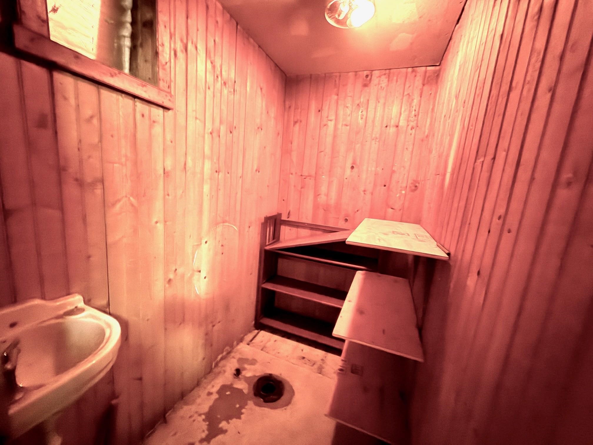 1 old half bath in basement