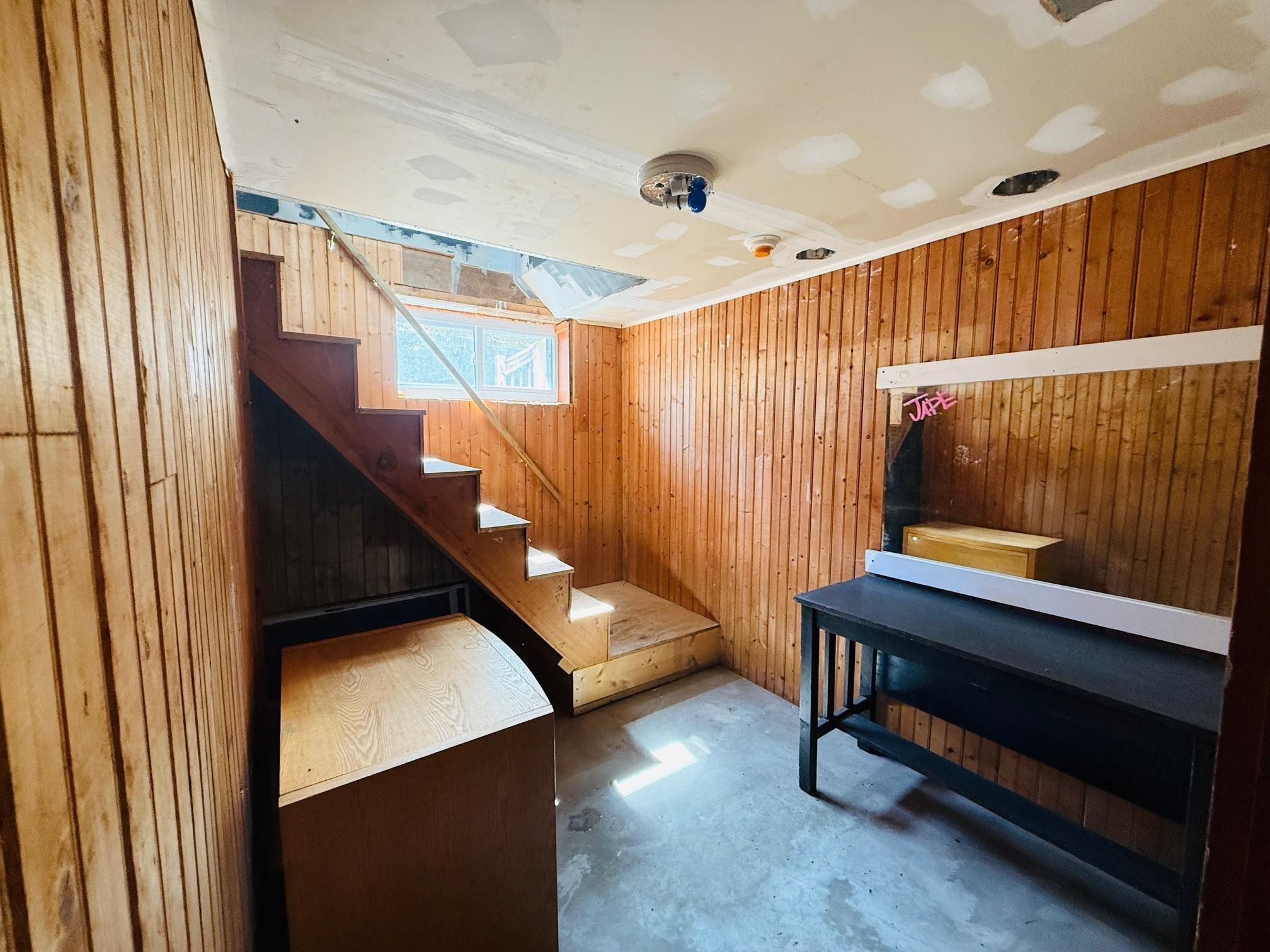 room with stairs to the 1st floor