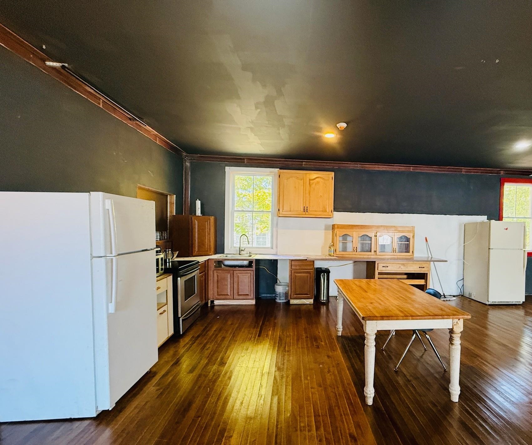 Kitchen, sink, refrigerator, cabinets and counter top