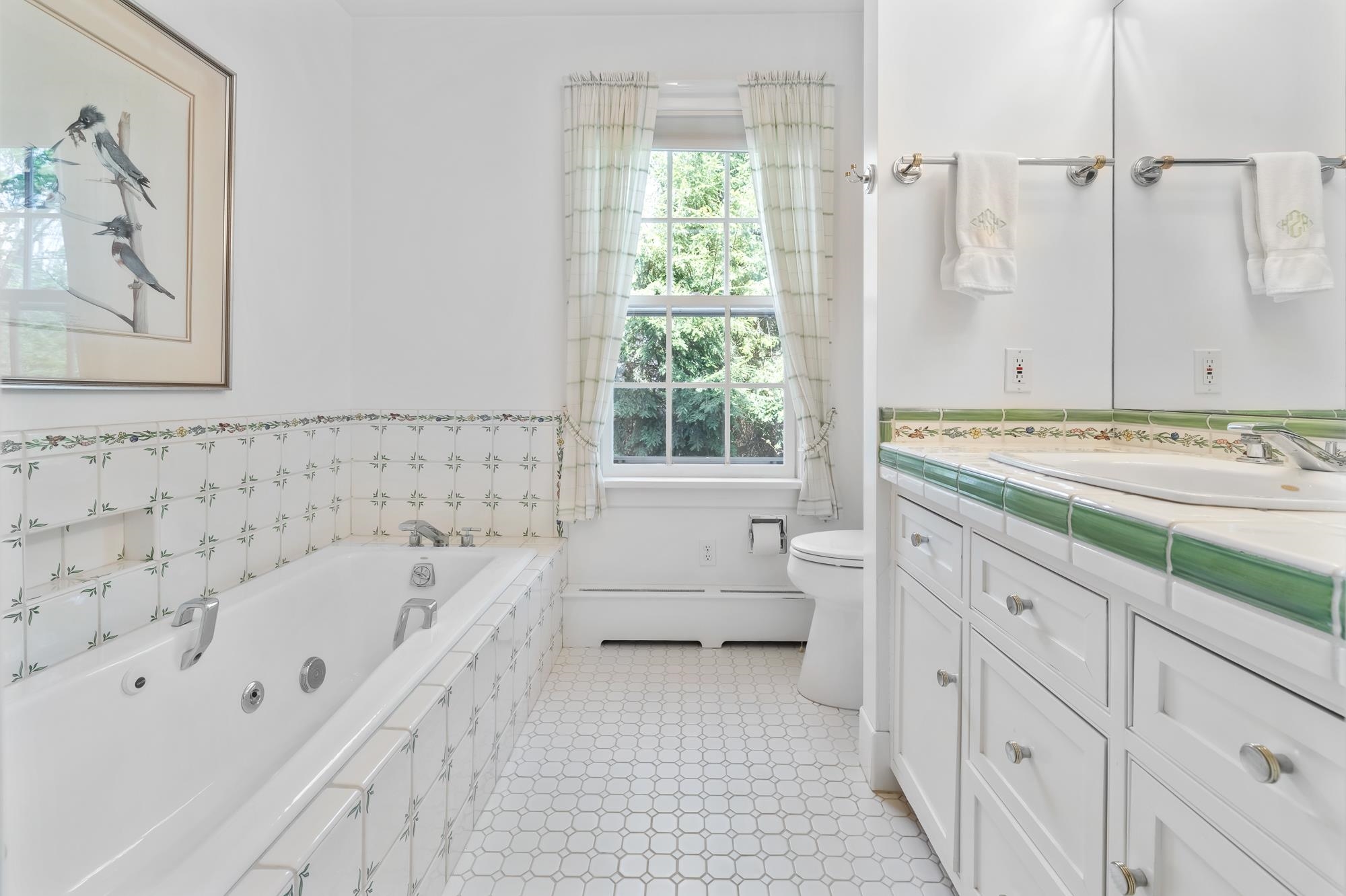 One of two primary suite bathrooms 23214926