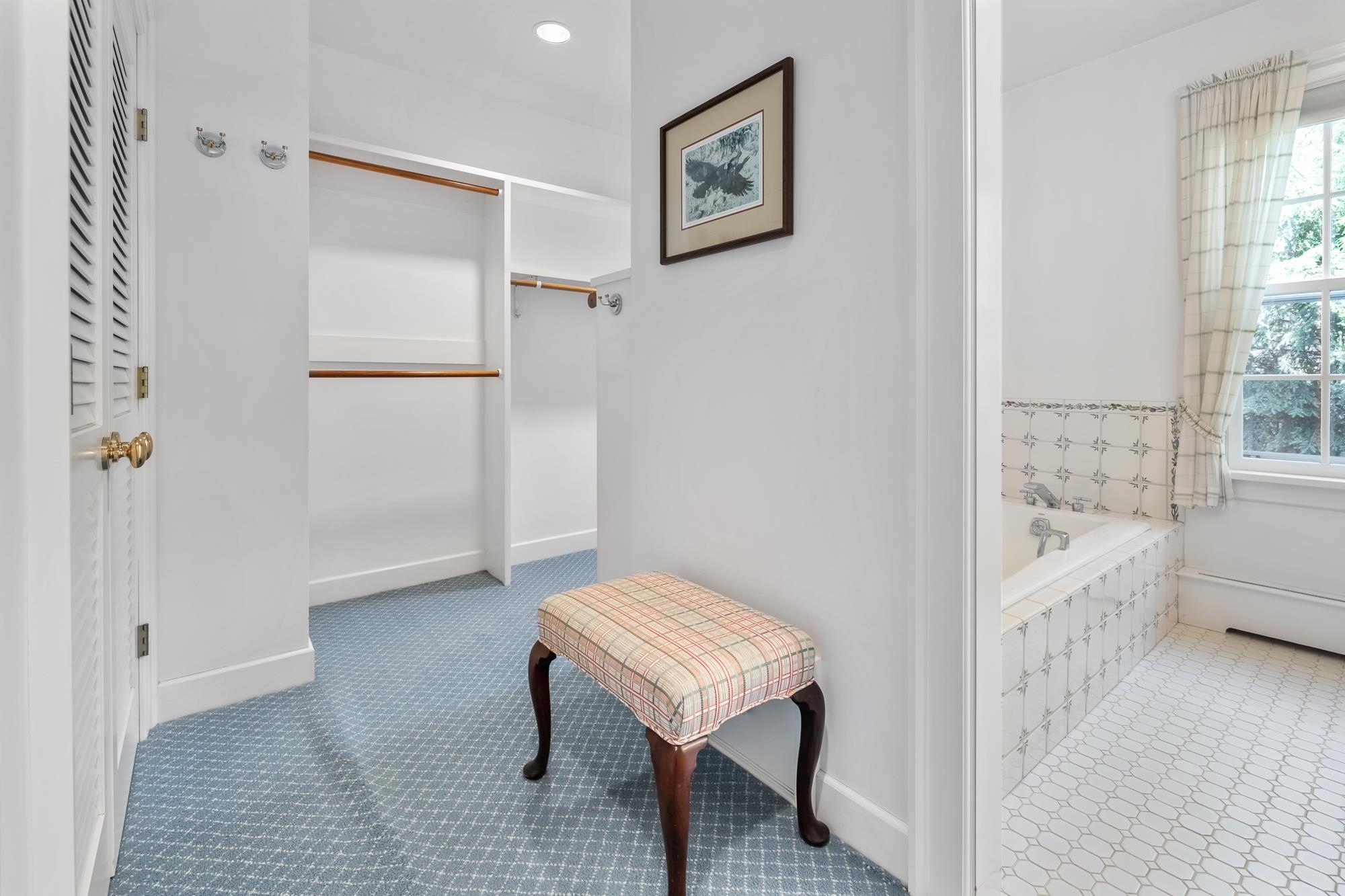 One of two primary suite closets 23214927