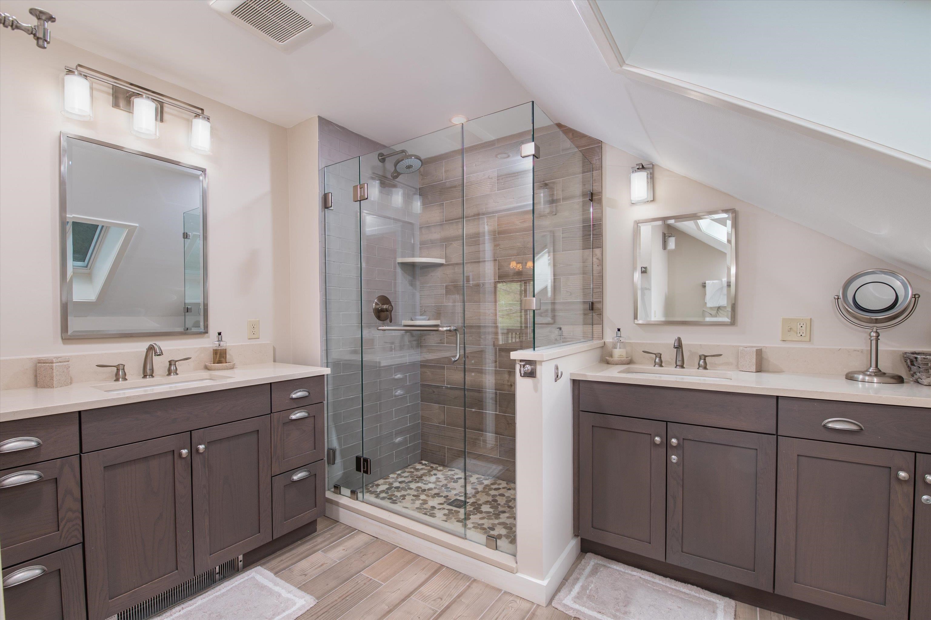 Primary Bedroom with 2 vanities and a Custom Shower 23513825