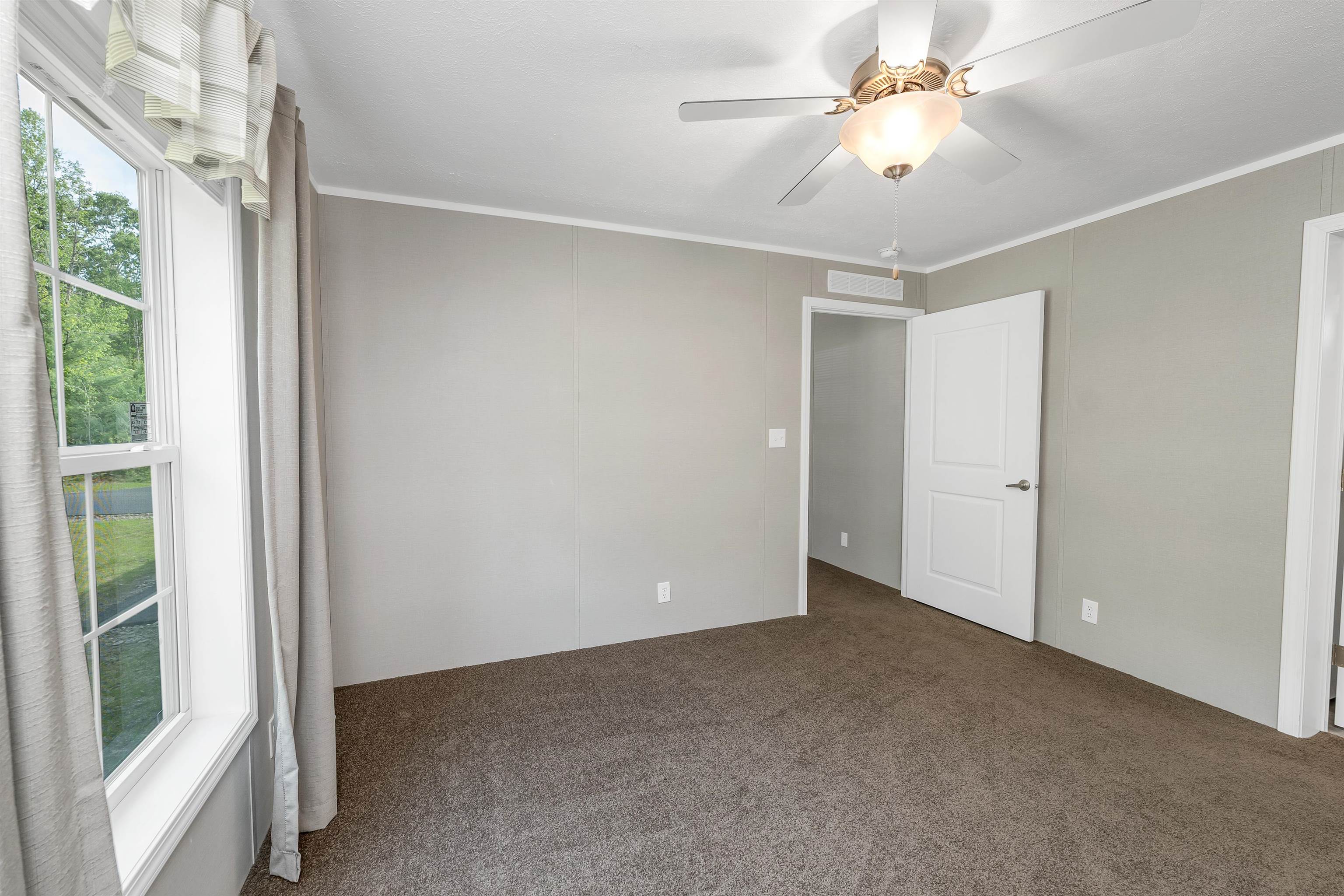 ENTRY TO LIVING ROOM FROM BACK ENTRY