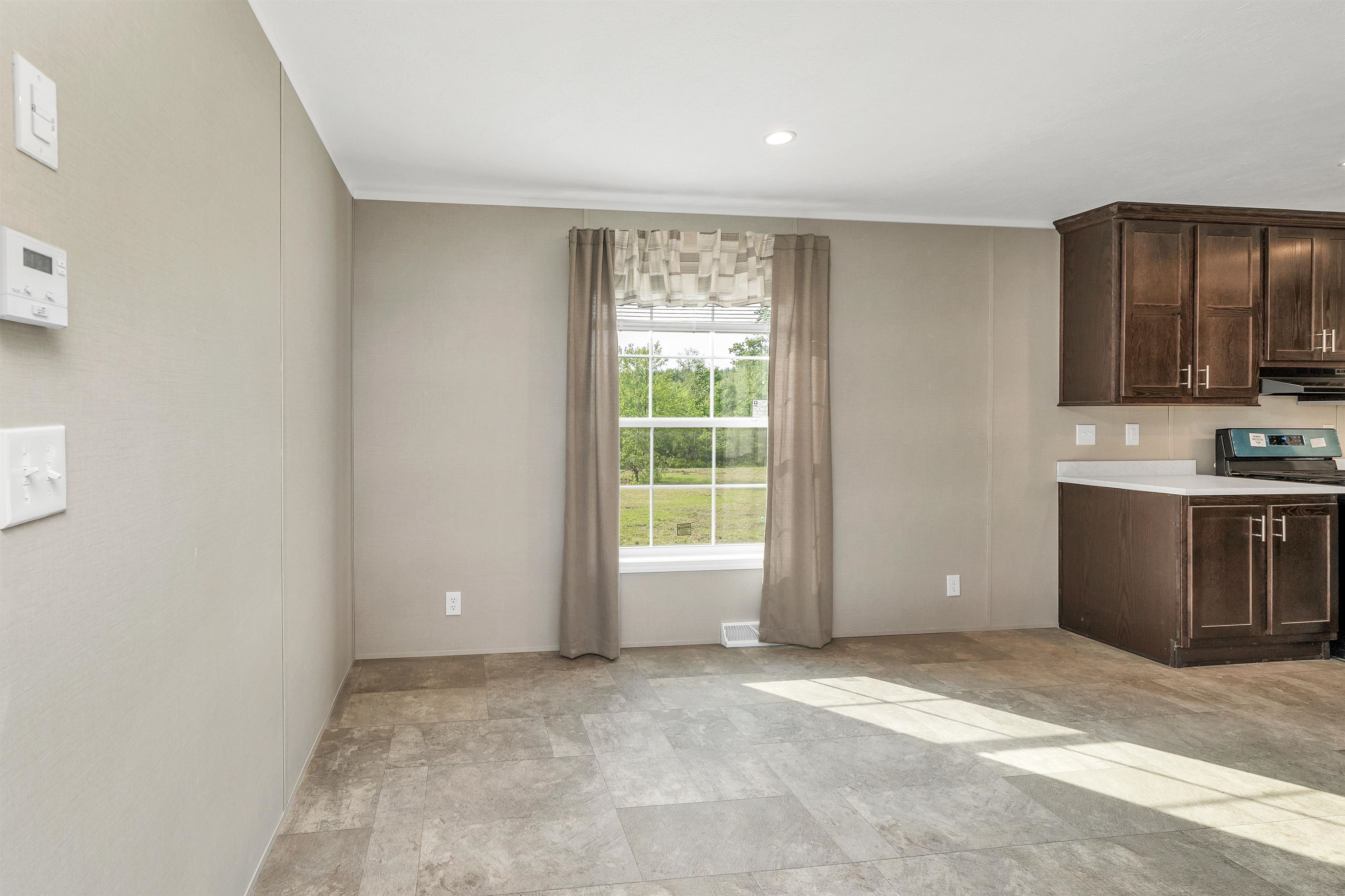 VIEW TO BACKYARD FROM KITCHEN/LR