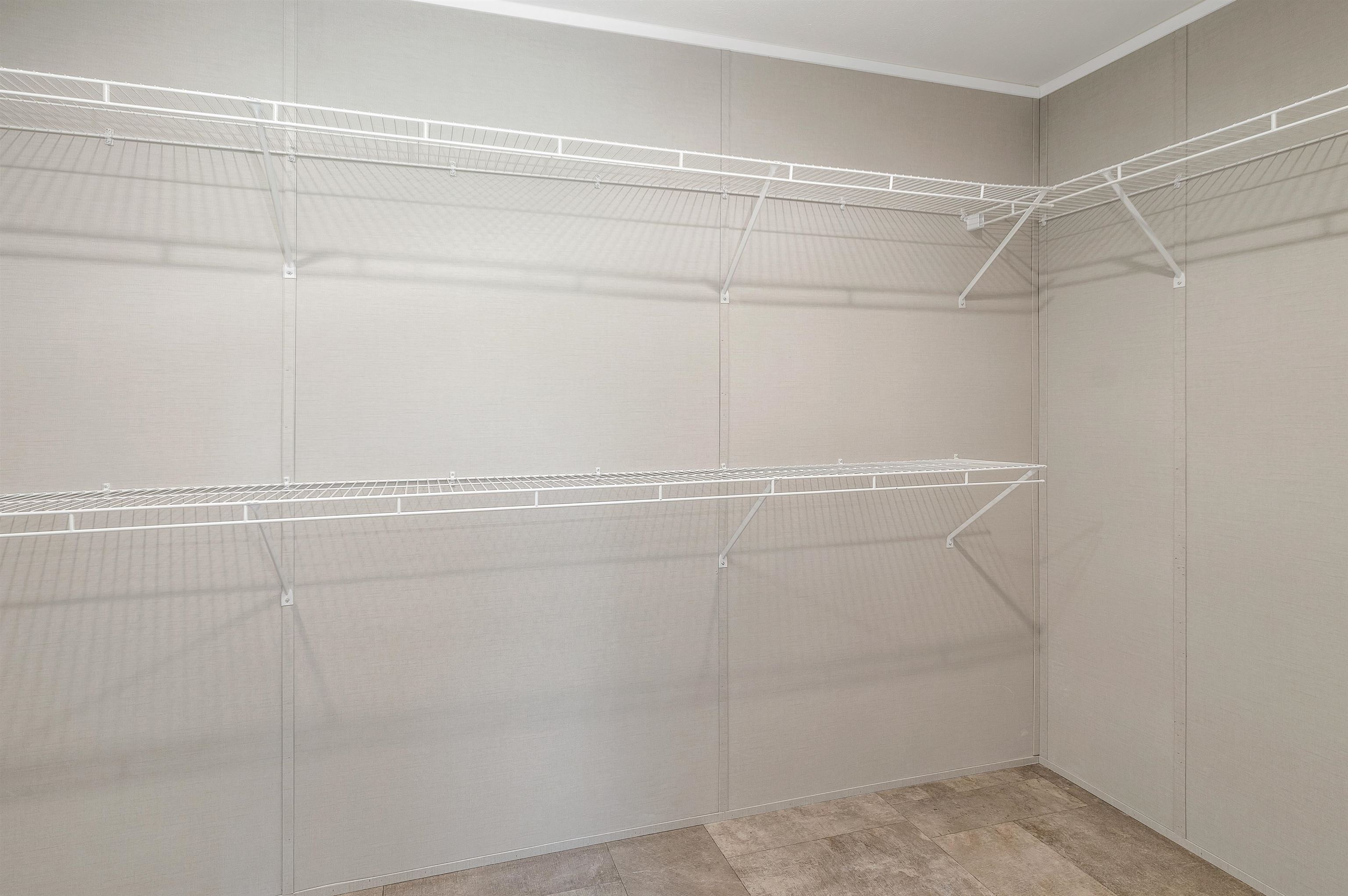 PRIMARY BEDROOM WALK IN CLOSET
