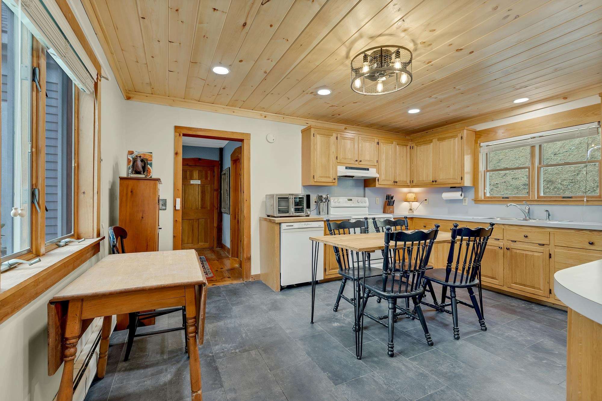 Kitchen to the left of the foyer