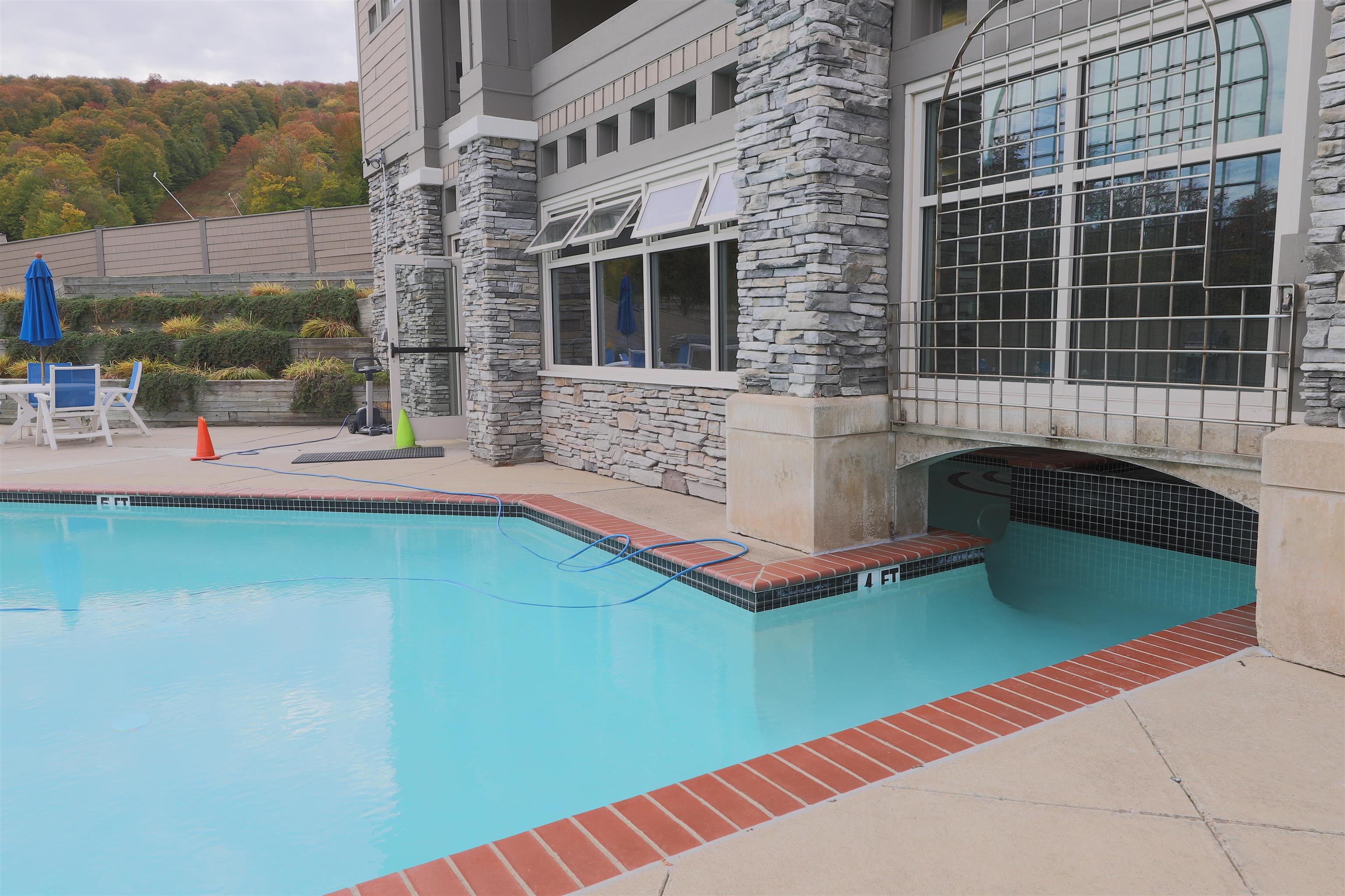 Indoor-outdoor year round heated pool 23534008