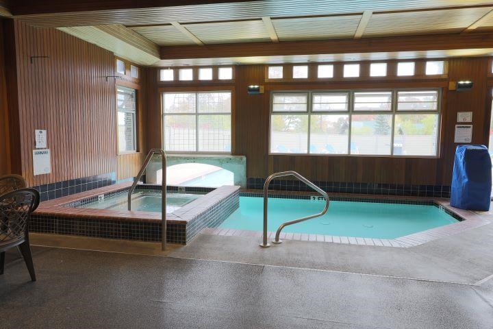 Indoor pool entrance and hot tub 23534010