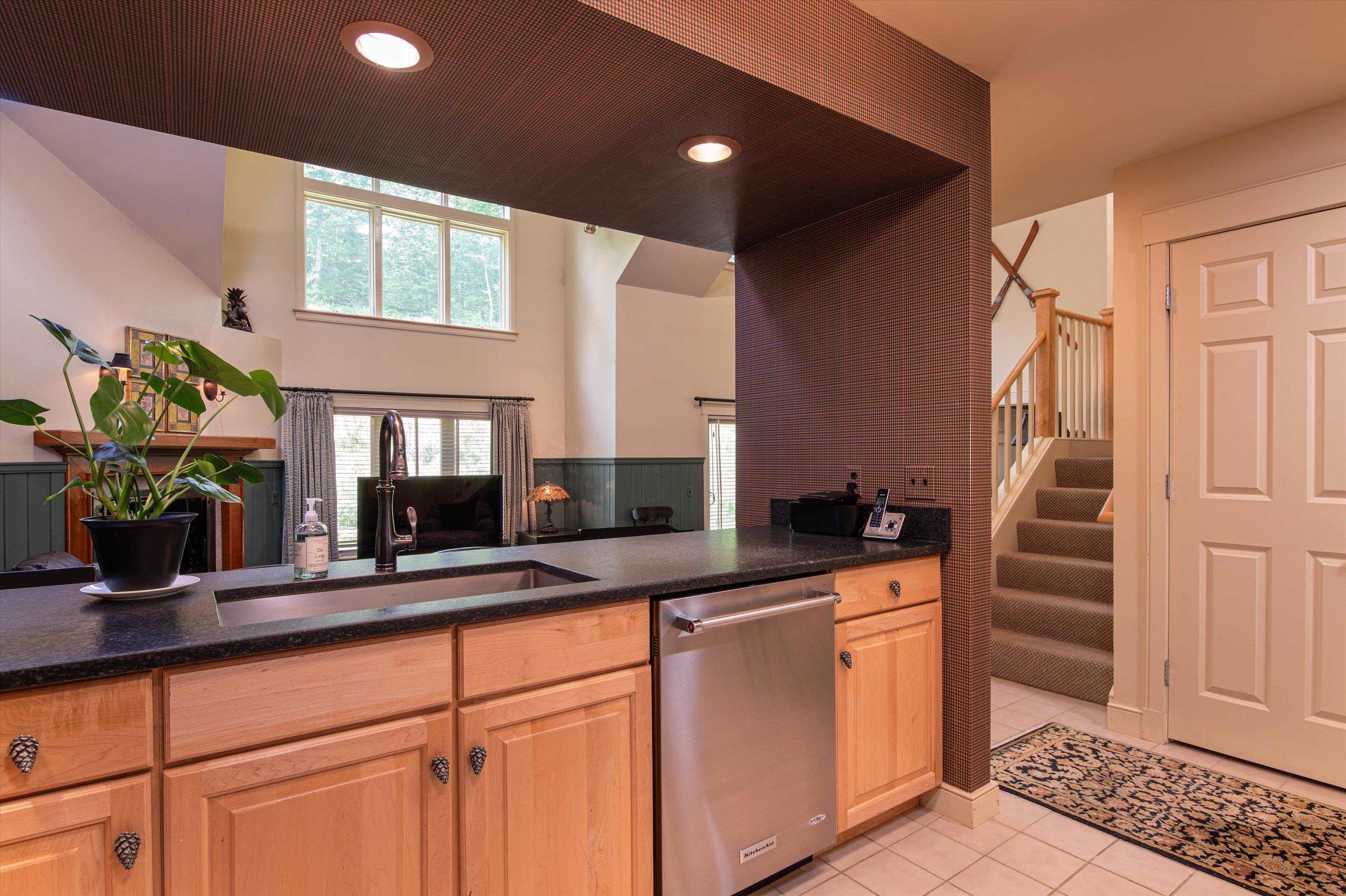 Kitchen overlooking the open living & rooom rooms 23533968