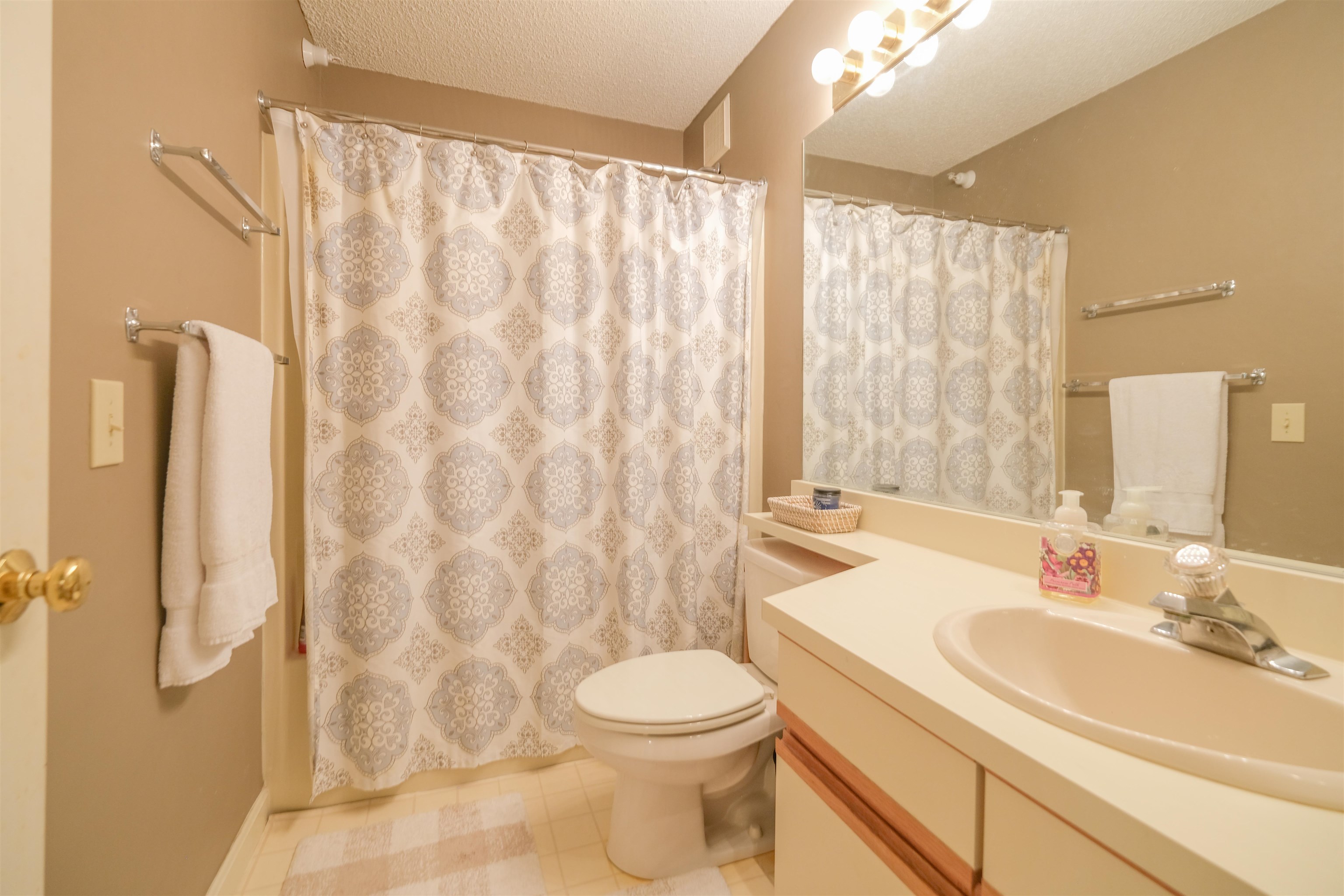 One of two full bathrooms 23567595