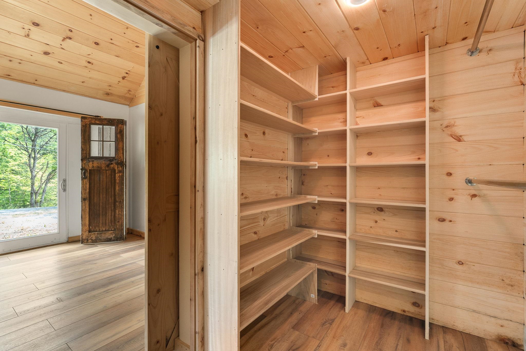 Large primary walk-in closet. 23714458