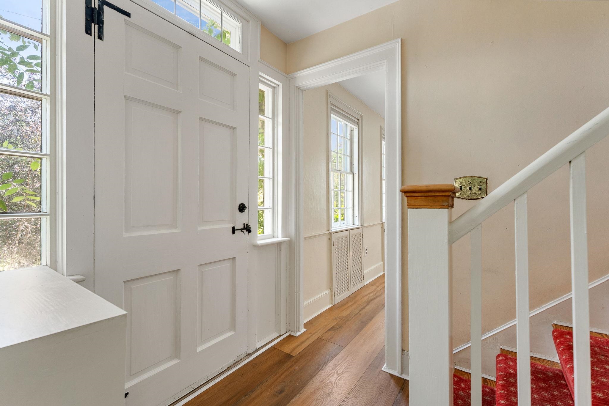 There is a small powder room located just off the front foyer. 23714519