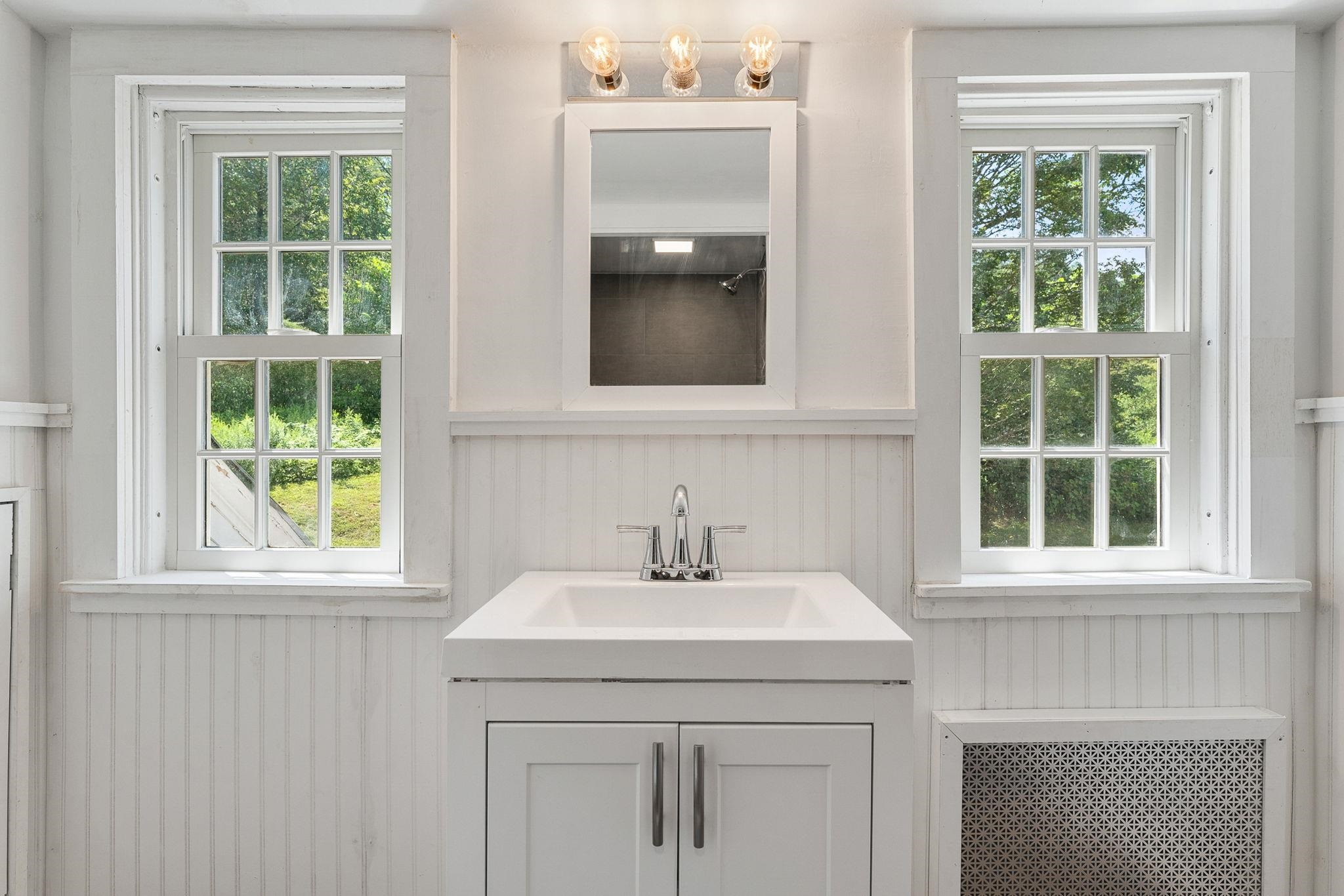 Beautifully updated bath on the second level. 23714561