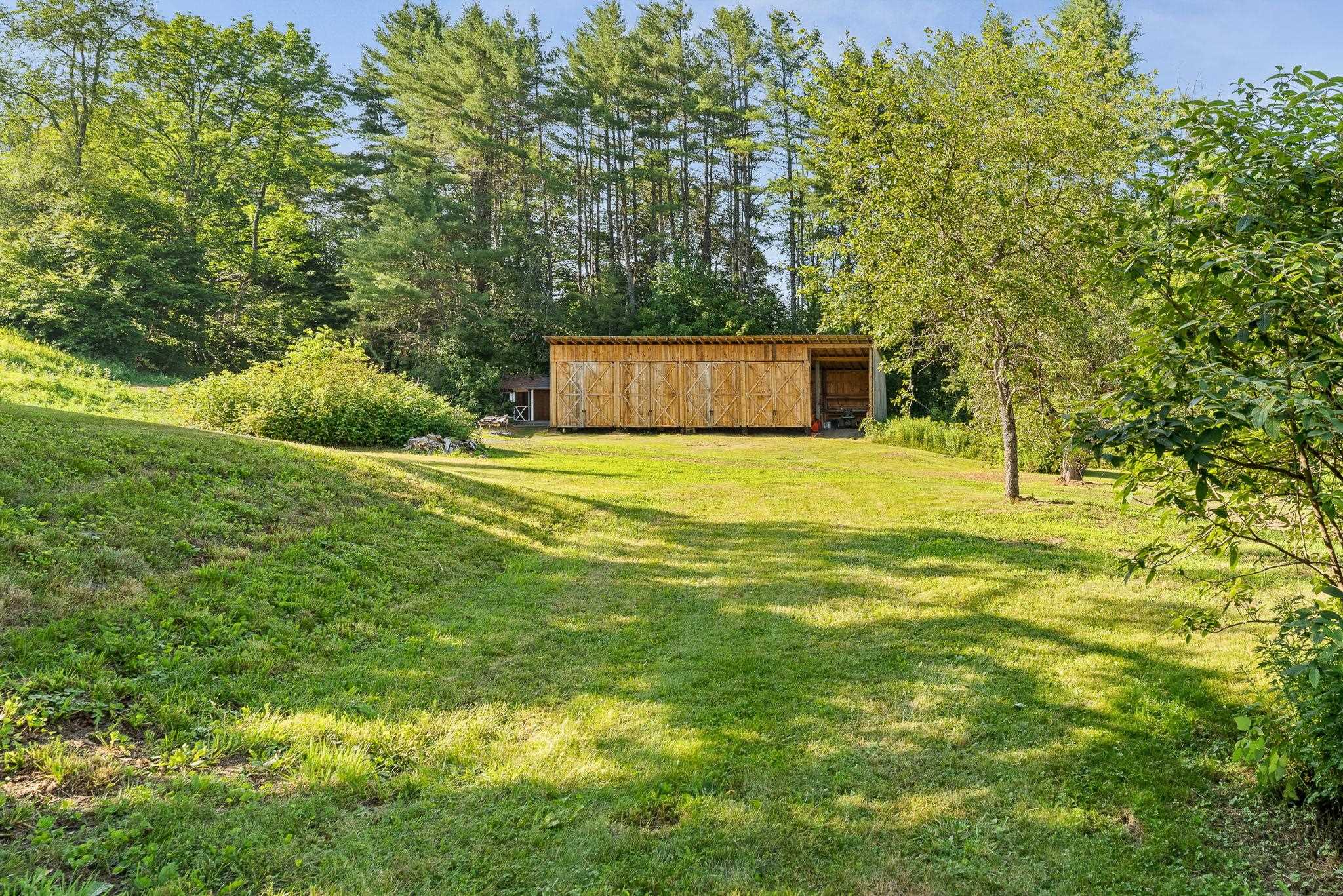 The 5-car garage was built only two years ago with the thought of converting to a barn. 23714562