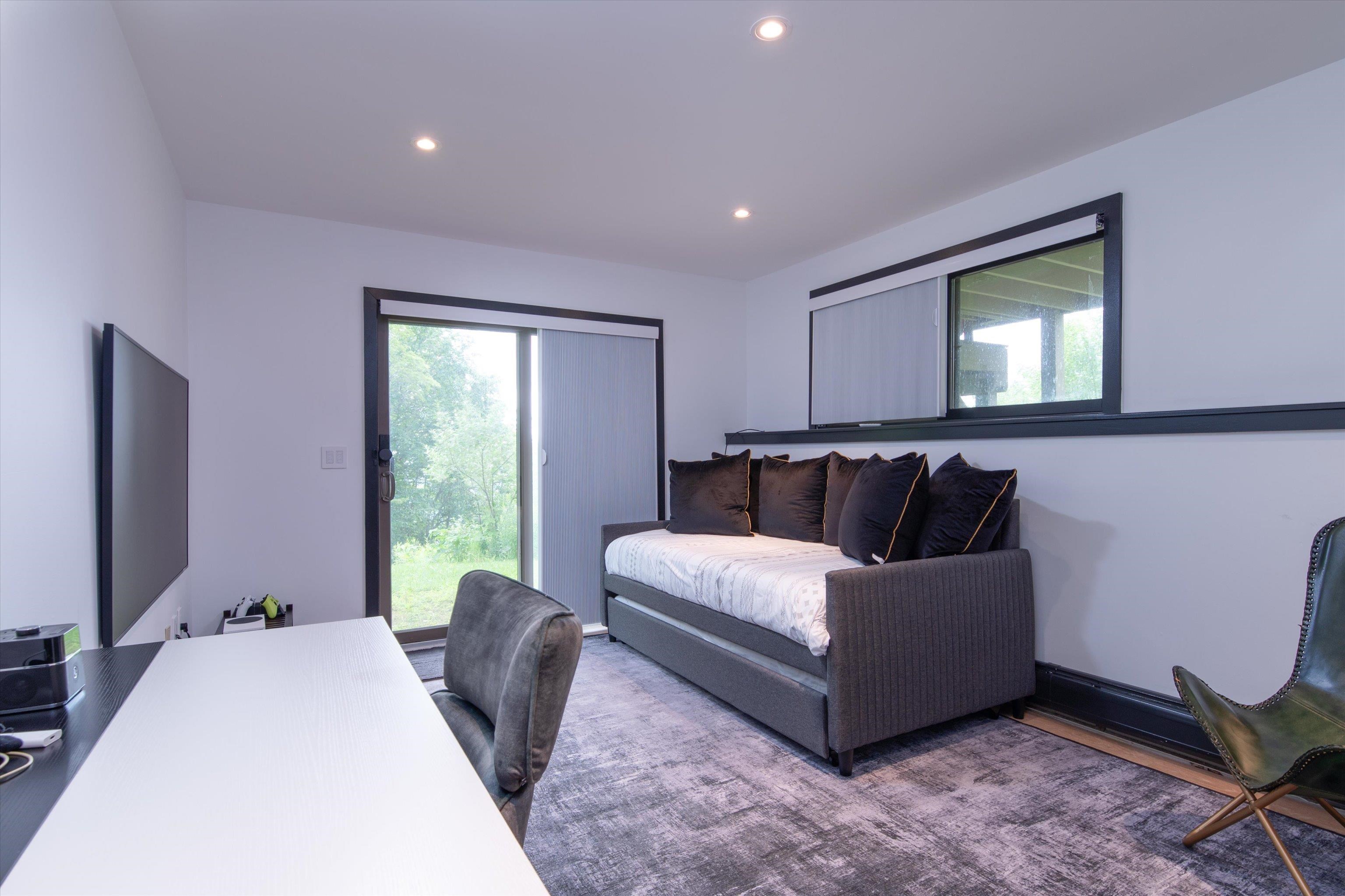 Lower Level Bedroom/Office or Den with Sliders to the Trail 23710831