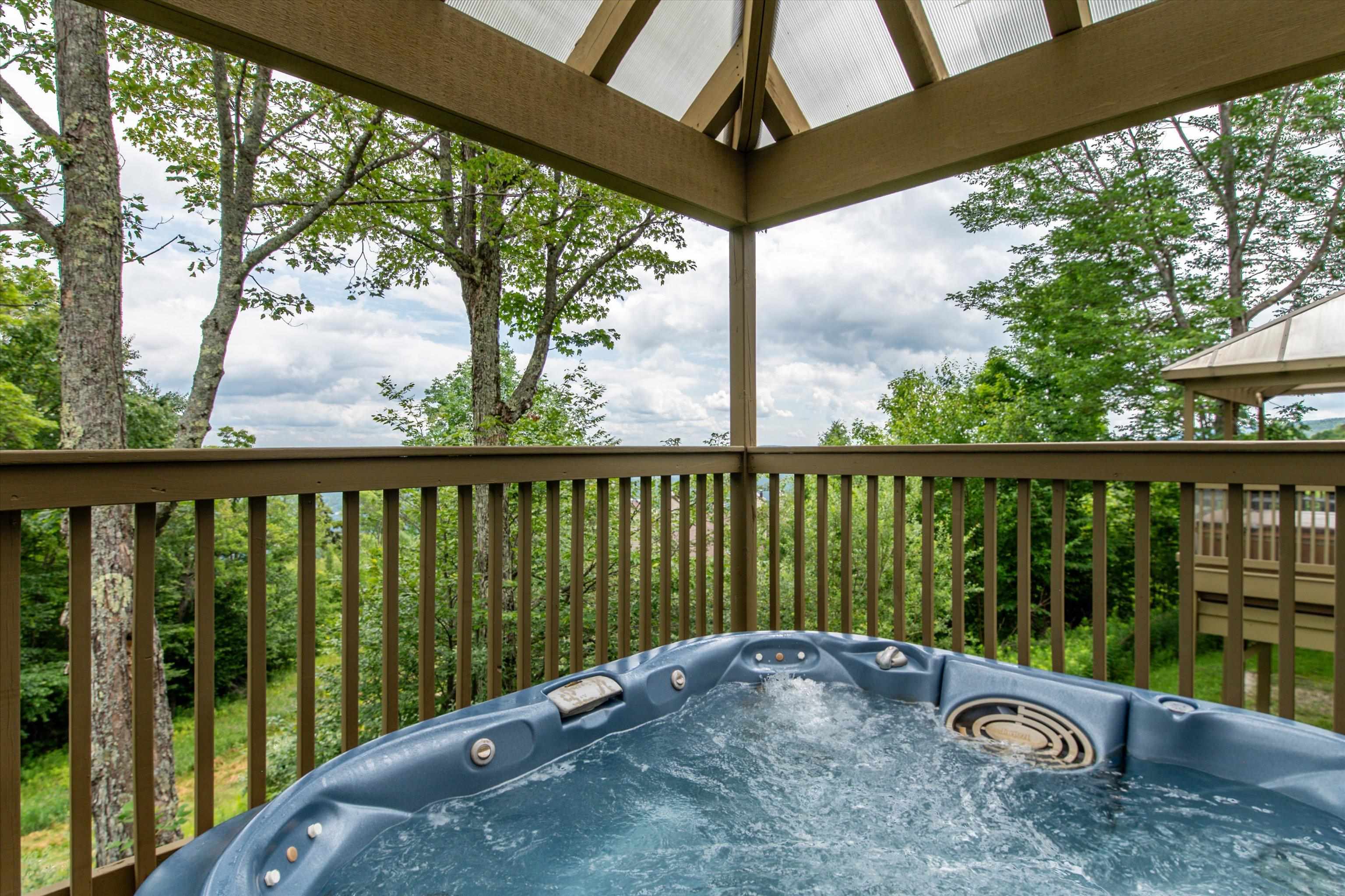 Relax in the Hot Tub on the Expansive Deck 23710880