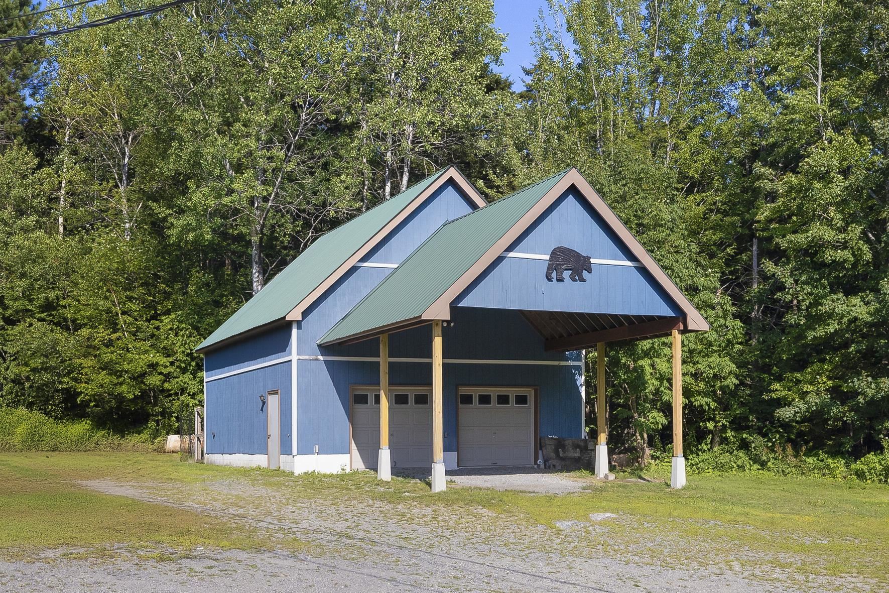 2 car garage w/carport & storage