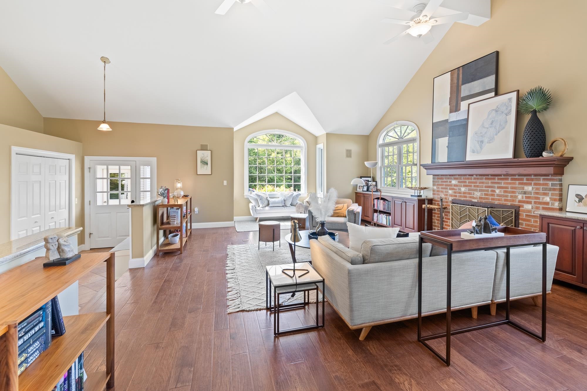 Great room with vaulted ceiling and fireplace