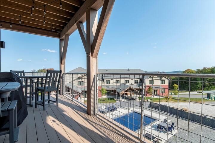 Deck on Recreation Lodge Overlooking the Pool. 23894395