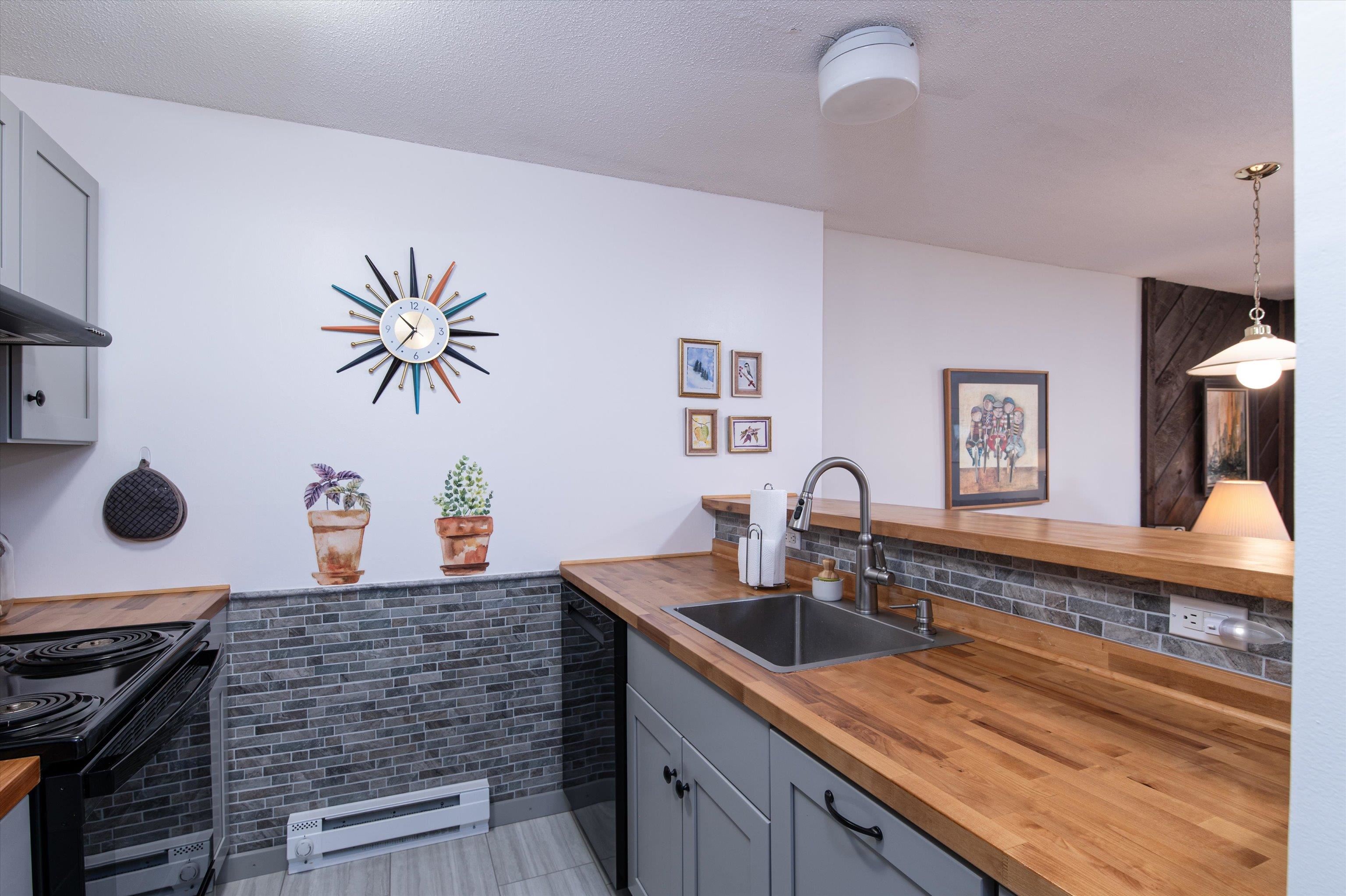 Butcher block counters with deep farmers sink 23907005