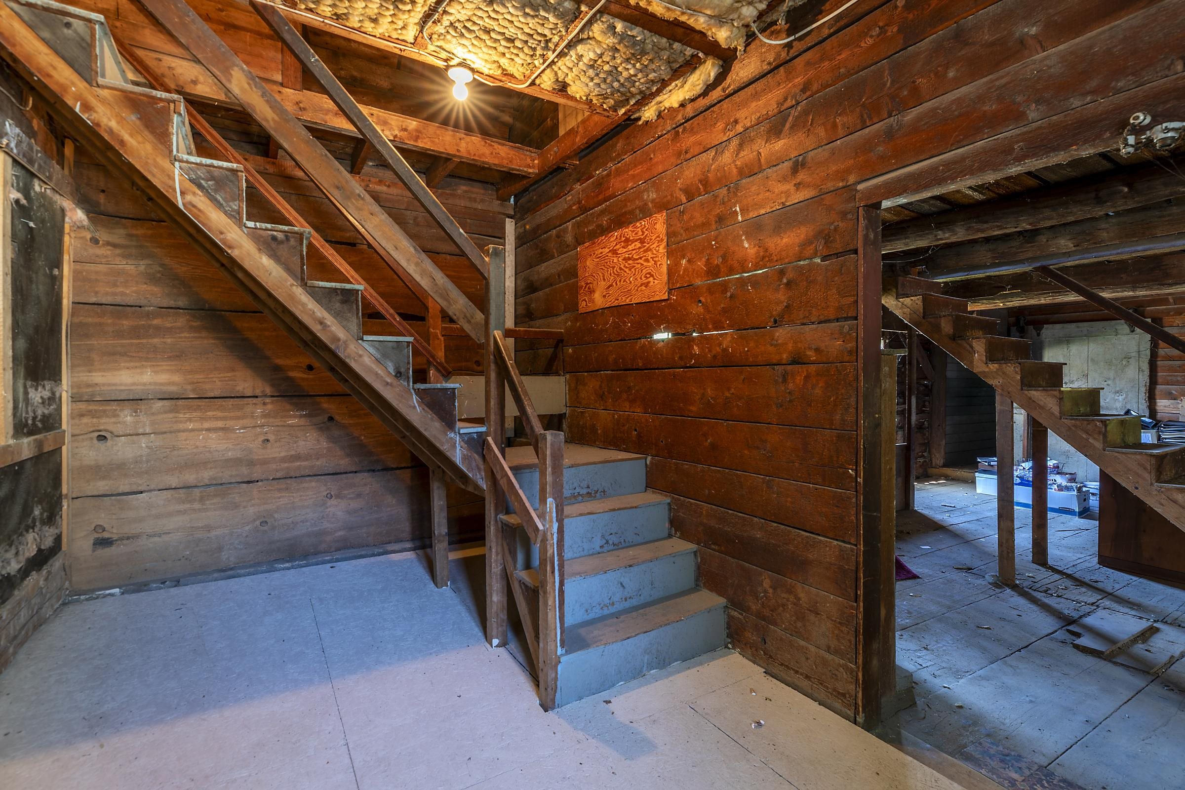 First floor back stairway adjoining barn