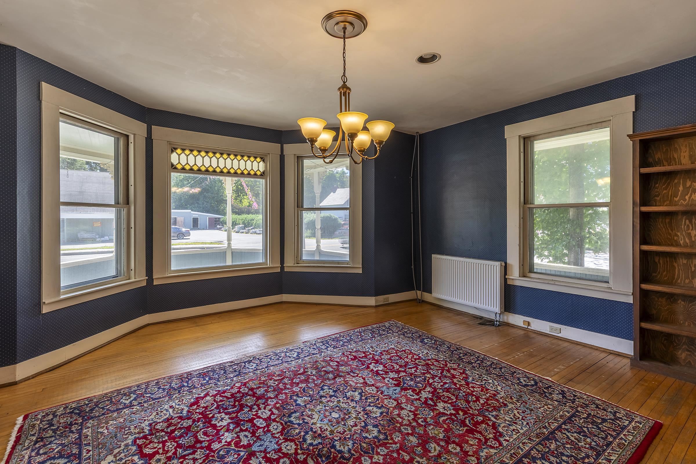Meeting room with large fixed window.