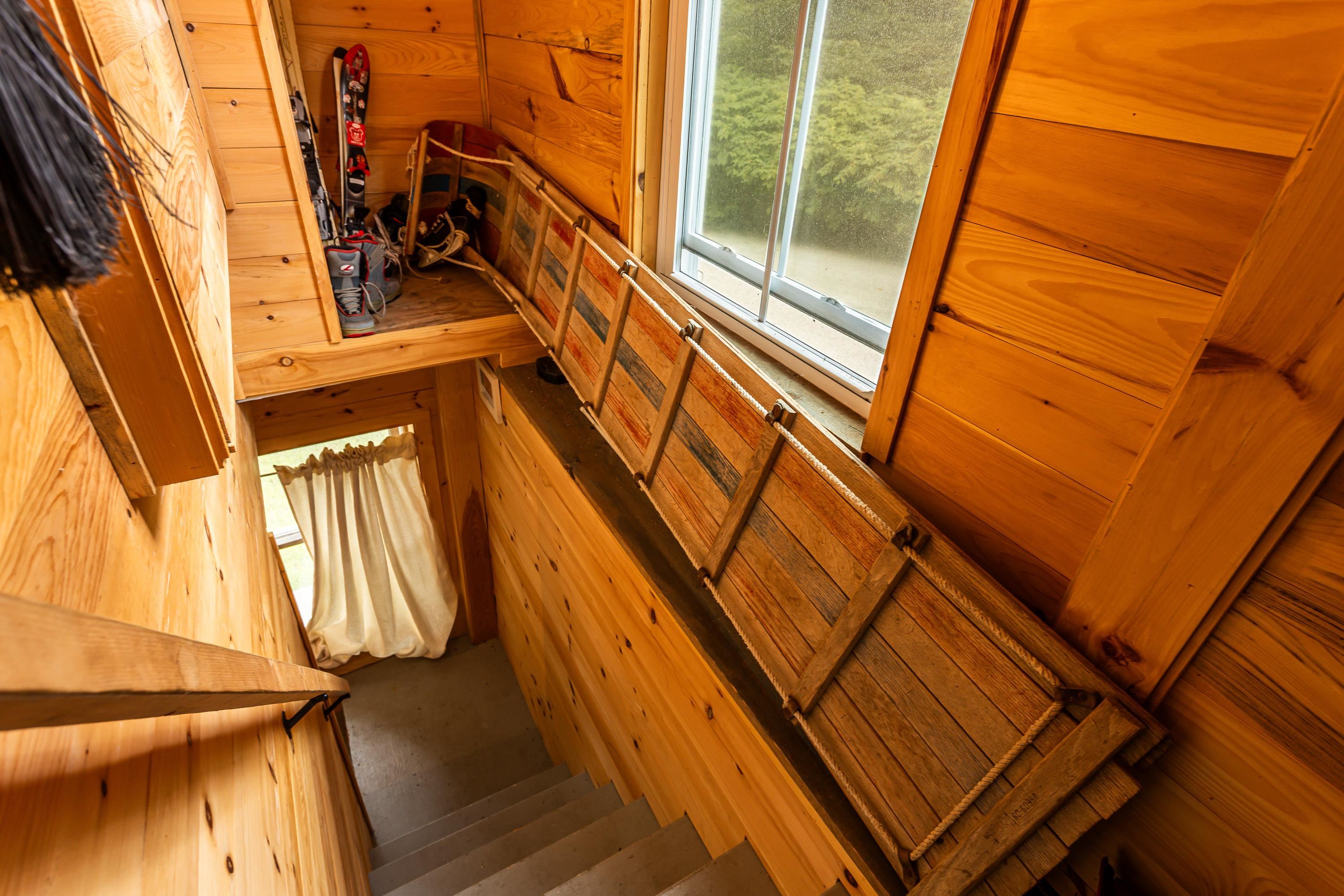 Wood Lined Stairs to Lower Level