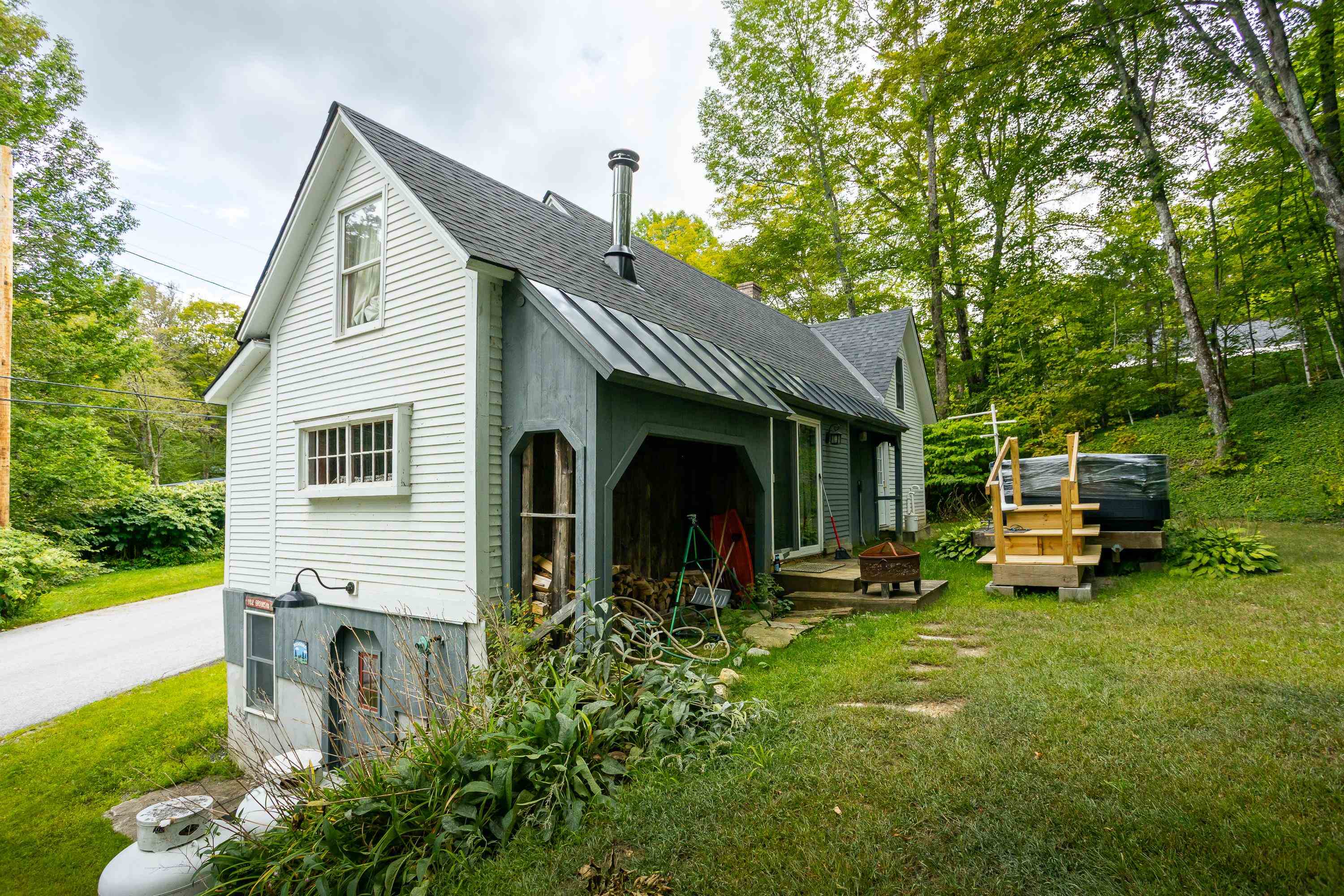 Back of House with Hot Tub