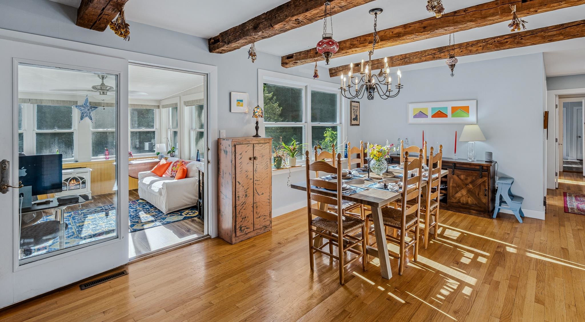 Cozy Sunroom Accessed from Dining Room