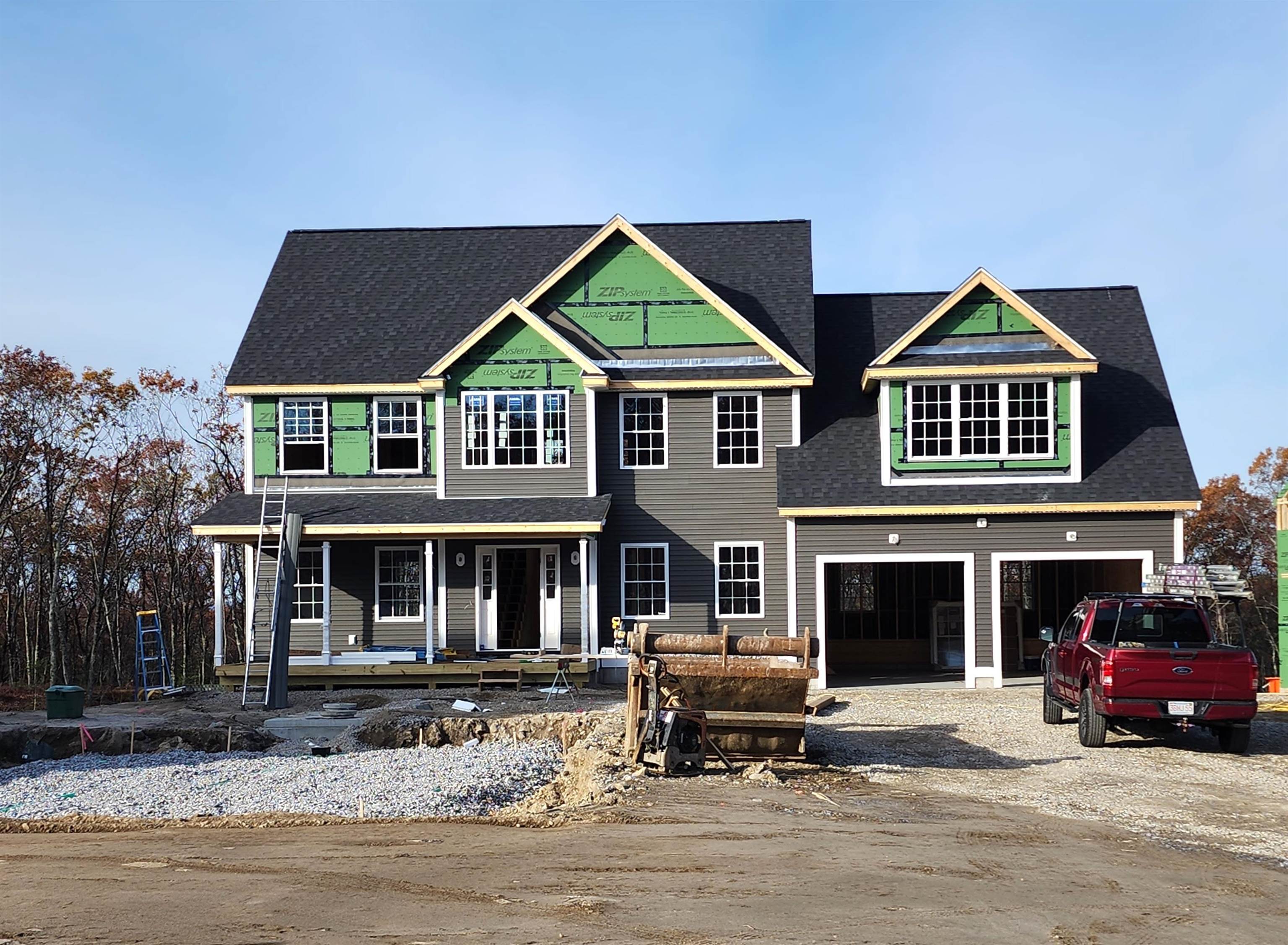 Welcome to Denali Estates, a sought-after new neighborhood of spacious single-family parcels with no HOA fees or restrictive covenants! Currently under construction, this elegant Hess Colonial offers a thoughtful, well-designed layout with space for everyone. The first floor features 9’ ceilings, hardwood floors, a formal dining room, private home office, and both a family room with fireplace and a front living room. The kitchen is a showstopper with a walk-in pantry, generous cabinetry, and slider to the rear deck—perfect for gatherings and everyday living.  Upstairs, retreat to the luxurious primary suite with a large walk-in closet and spa-like bath, complete with tiled shower, soaking tub, and double vanity. Three additional bedrooms, a full bath with ample storage, and convenient 2nd-floor laundry complete the level.  Enjoy morning coffee on the covered front porch or expand your living space with the walkout basement featuring high ceilings—ideal for finishing in the future. All of this in a prime location, just minutes to I-93, shopping, dining, parks, the rail trail, and Lake Massabesic.  Ready for you to select your cabinets and flooring! Make it your own today!