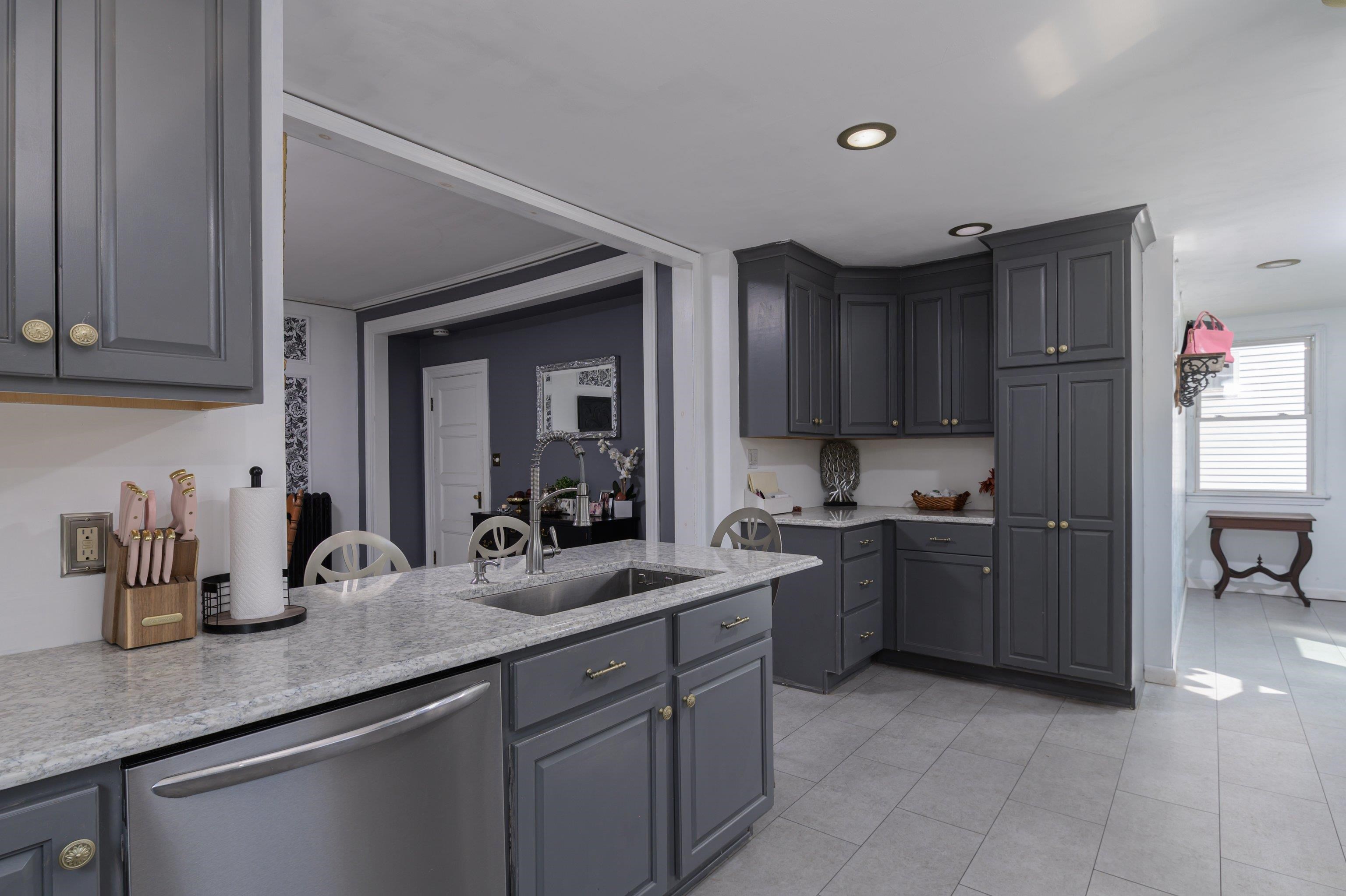 AMPLE CUSTOM CABINETS & COFFEE STATION