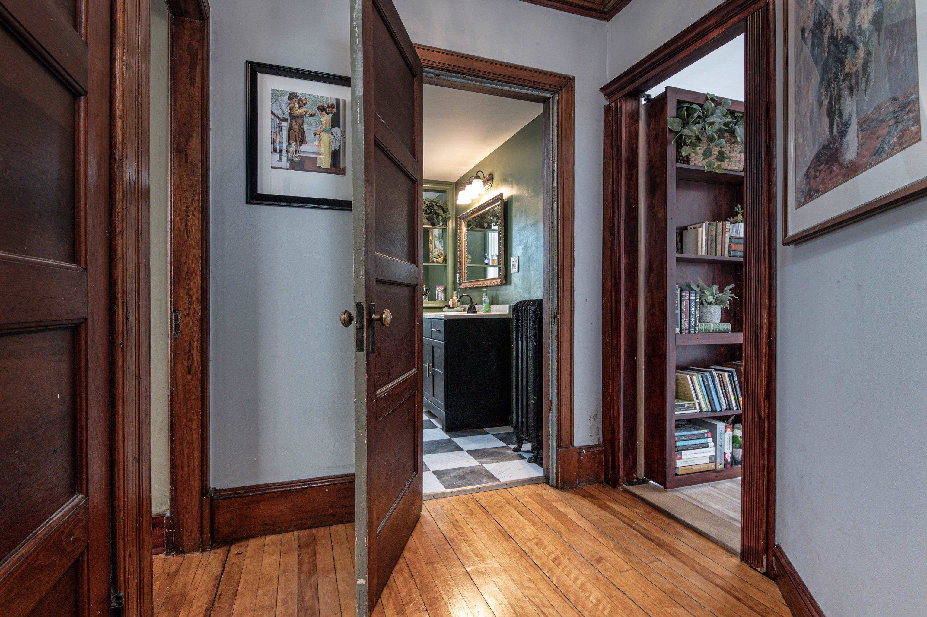 BEDROOM THREE BEHIND THE BOOKSHELF DOOR