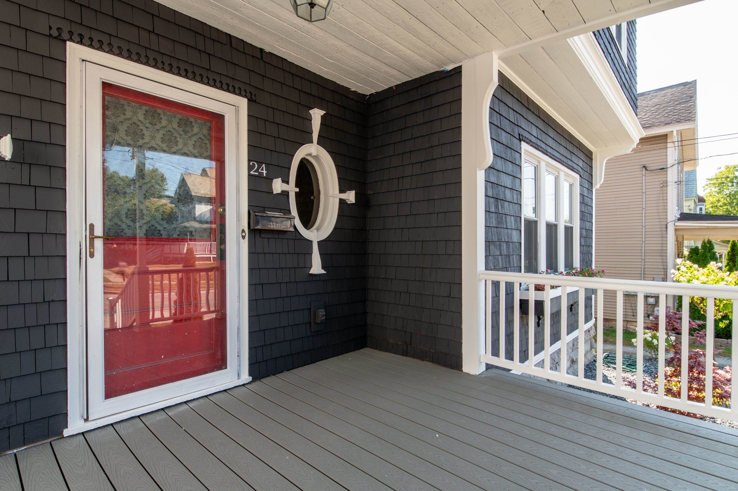 FRONT PORCH WITH ARCHITECTURAL HIGH POINTS