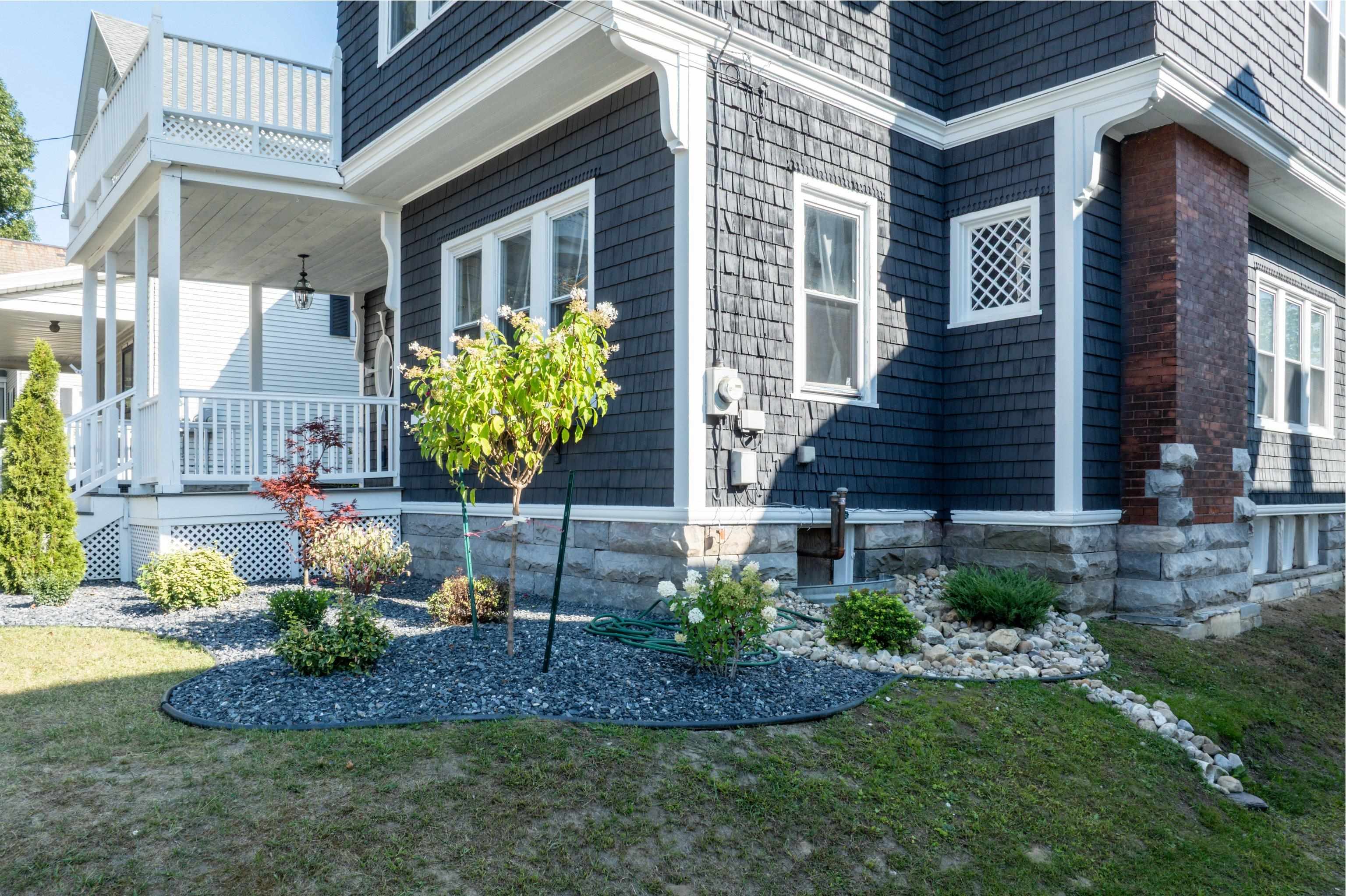 DETAILED OLD WORLD ARTISANSHIP IN STONE AND CEDAR
