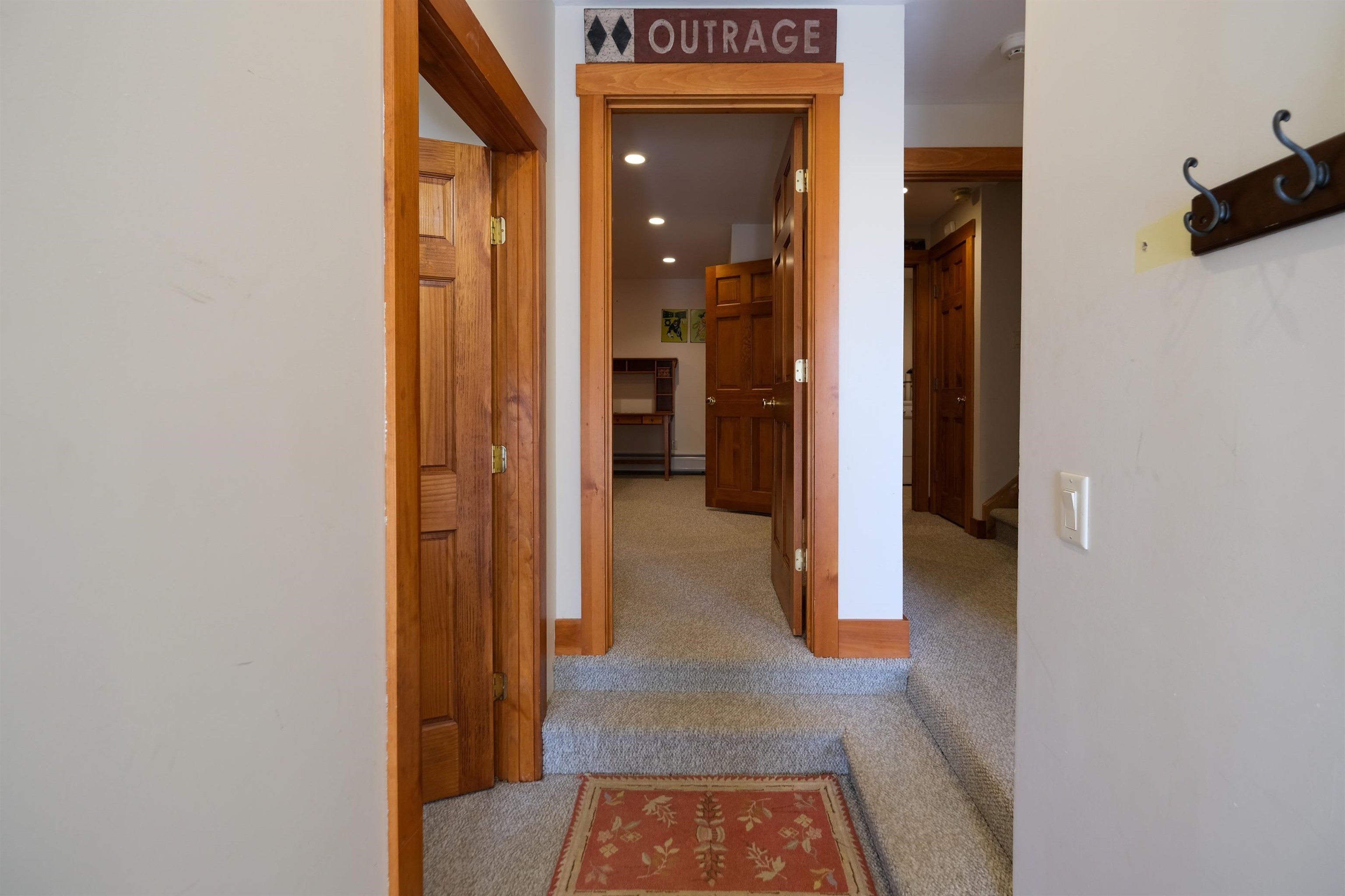 Lower hall with laundry on the end. 24099227