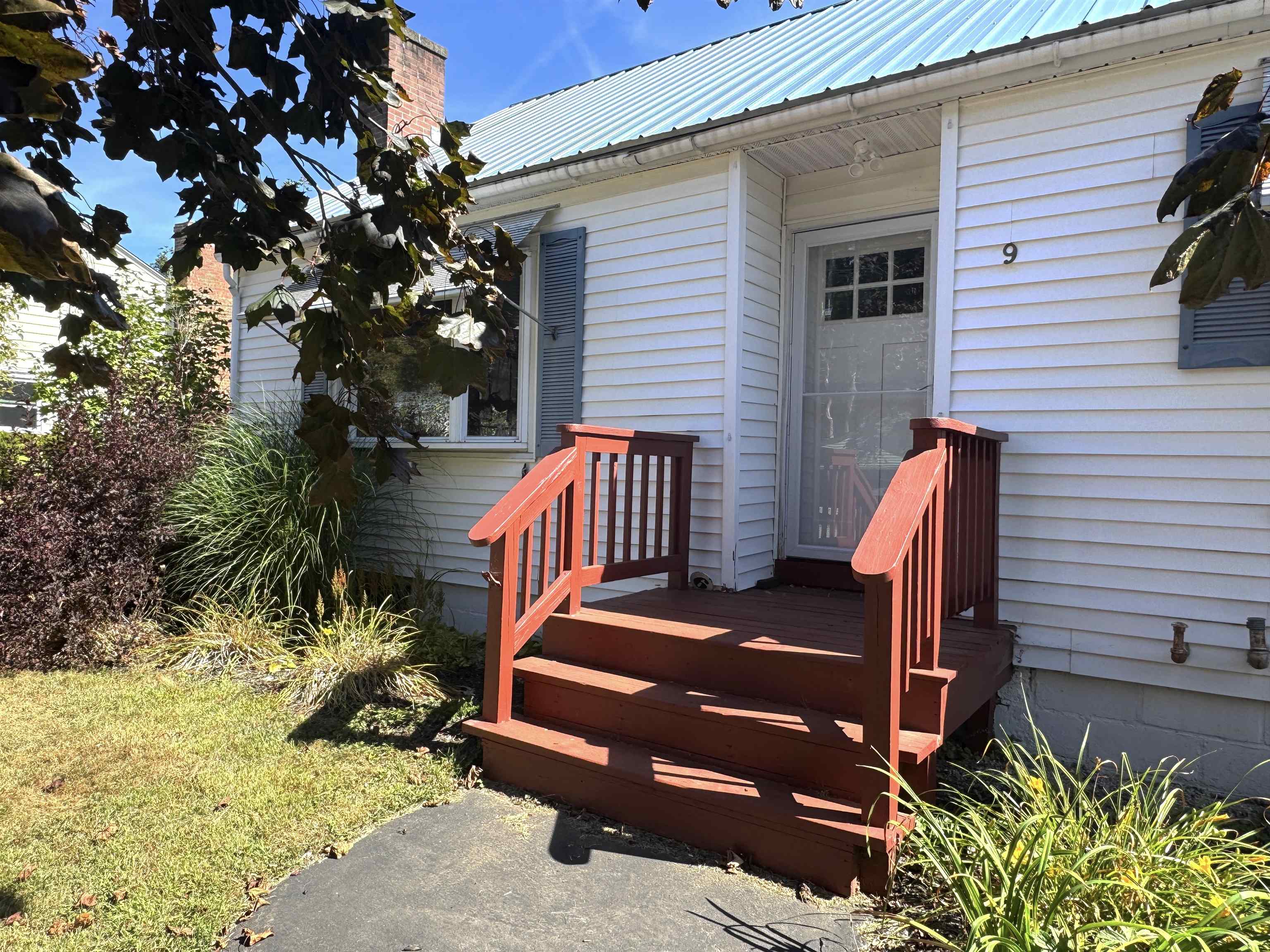 Sweet red front steps welcome you in 24131844