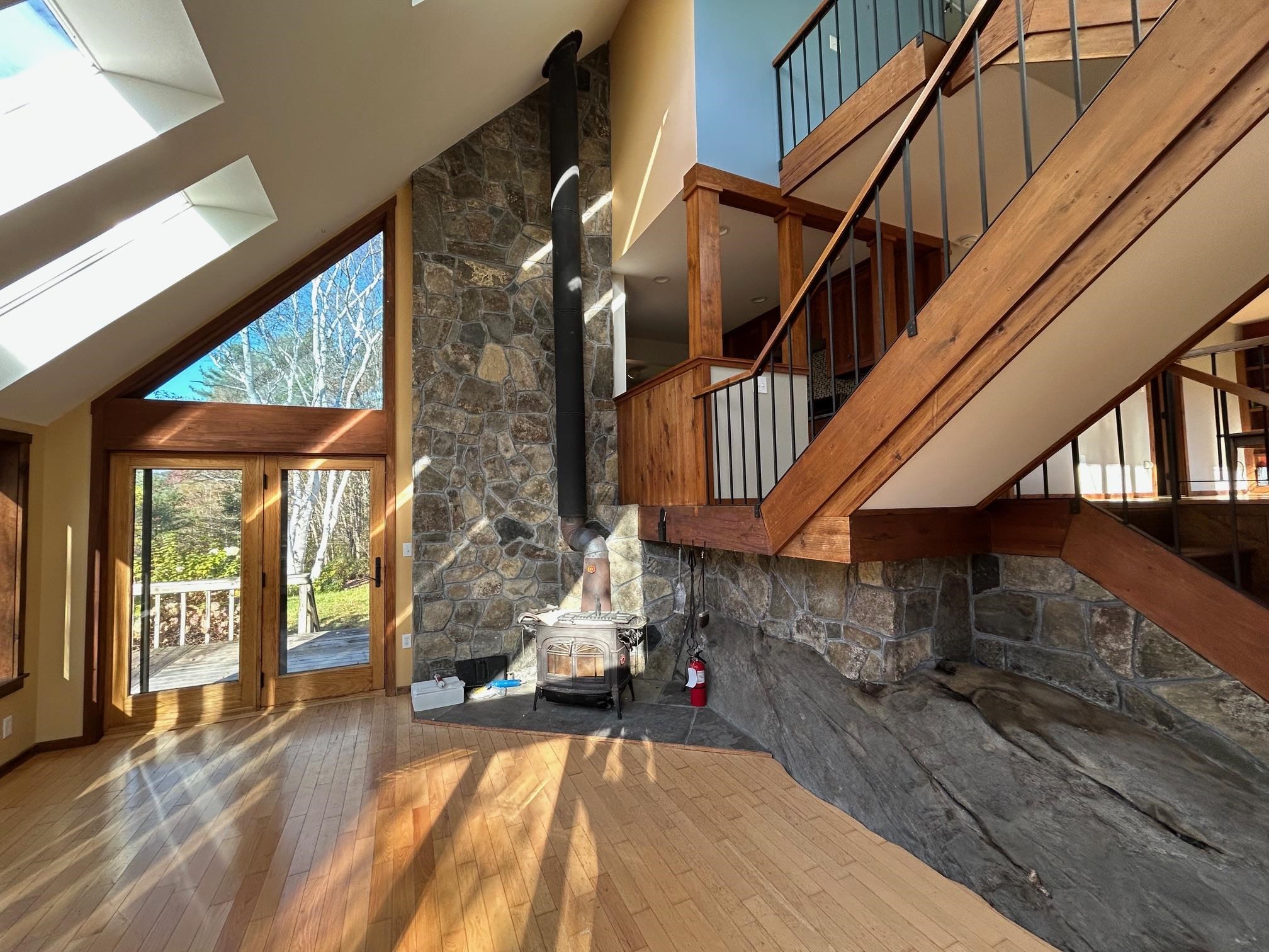 Sunken living room, stonework & woodstove 24222173