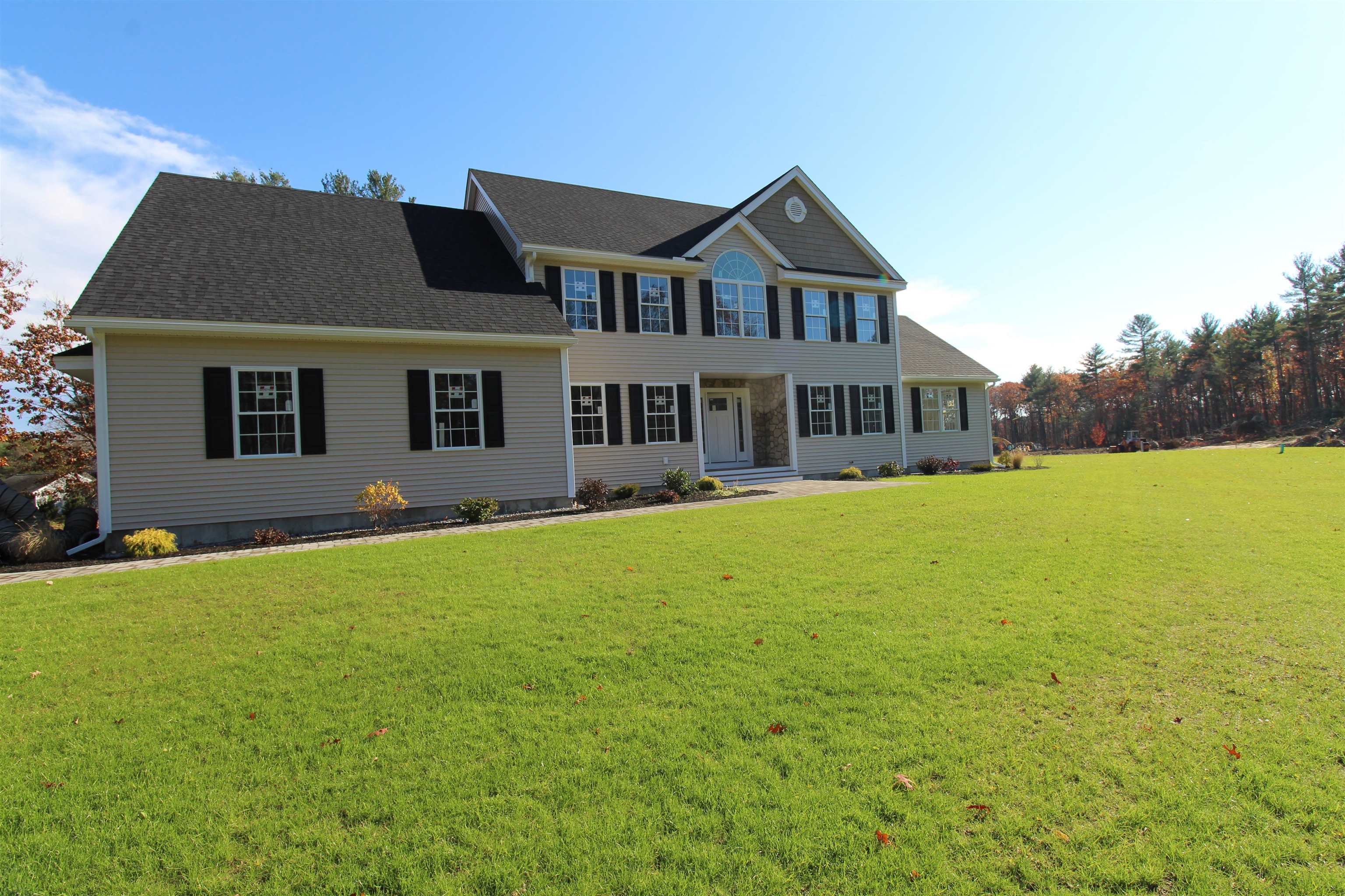 Exceptional New Construction Hip Roof Colonial on a Quiet Dead-End Street Welcome to this elegant 8-room, 4-bedroom Colonial, nestled on 1.01 acres in a neighborhood setting. Designed with comfort and modern living in mind, this home features 2.5 baths and high-quality finishes throughout. Enjoy gleaming hardwood floors in the kitchen, foyer, living room, dining room, family room, and all bedrooms. The kitchen flows seamlessly into open living spaces, perfect for entertaining. Upstairs, the spacious master suite offers a walk-in closet and a luxurious master bath complete with a freestanding soaking tub. Convenience is key with a second-floor laundry room. Additional highlights include: Three-car garage Lawn irrigation system to keep your grounds lush and green  This beautifully crafted home combines timeless design with modern amenities on a quiet dead-end street — a perfect retreat to call your own.  Estimated Completion date Mid January 2026