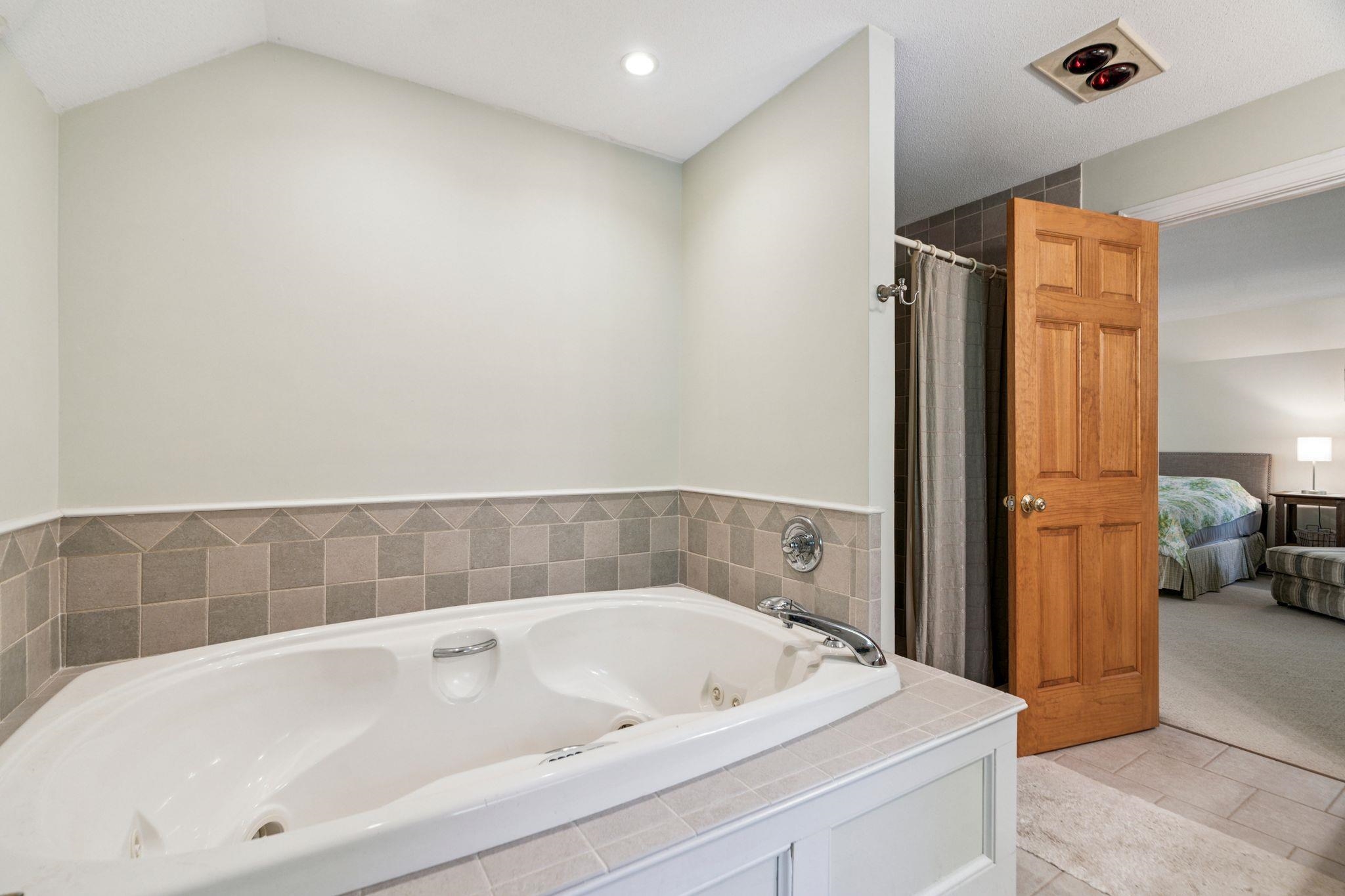 Soaking Tub and Tiled Shower 24193687