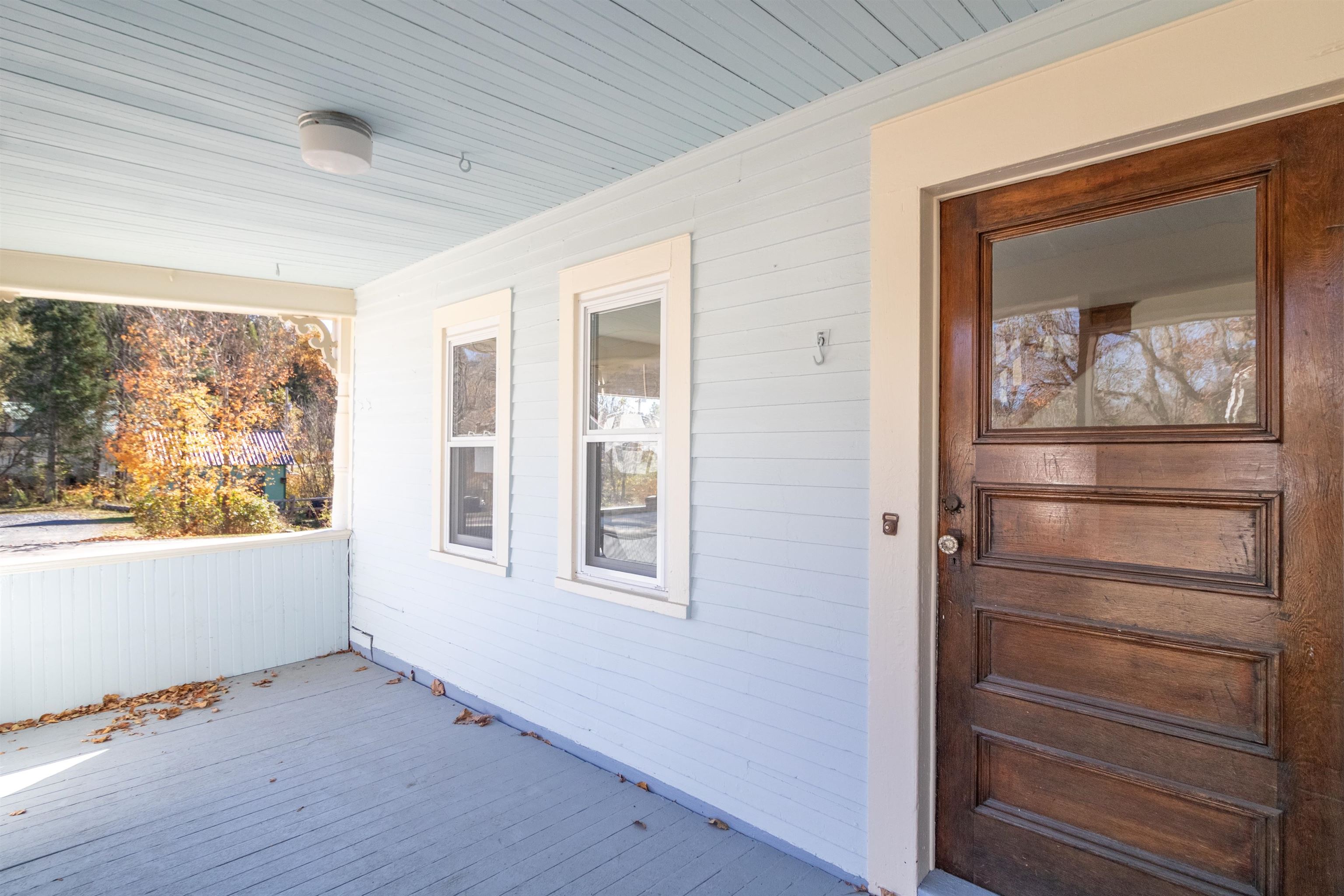 Porch with doors to dining room and kitchen