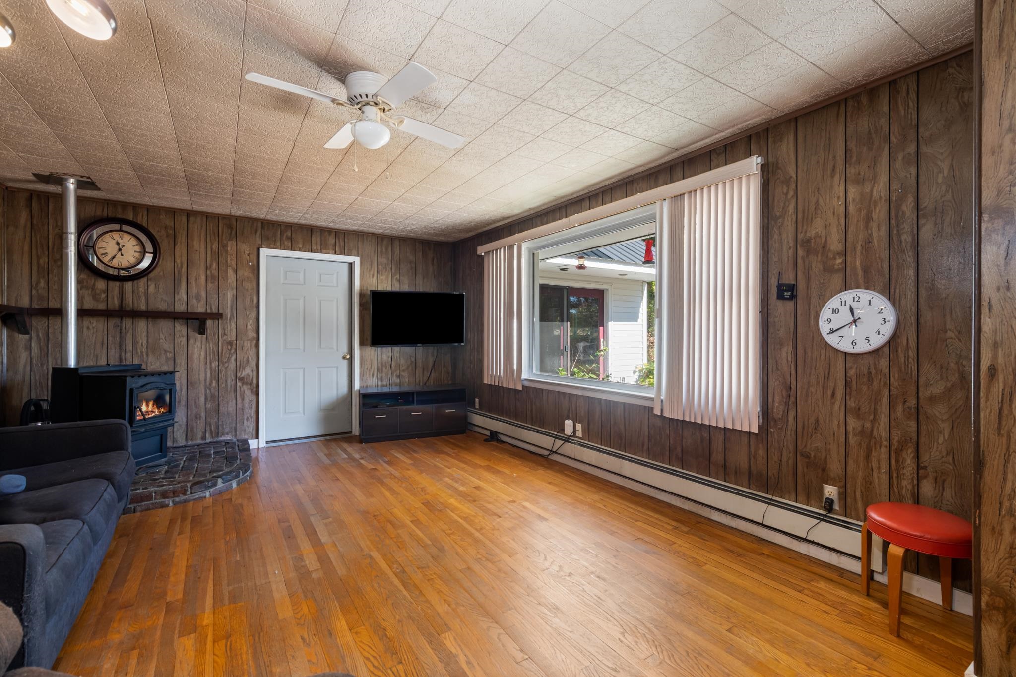 Door off living room leads to family room addition