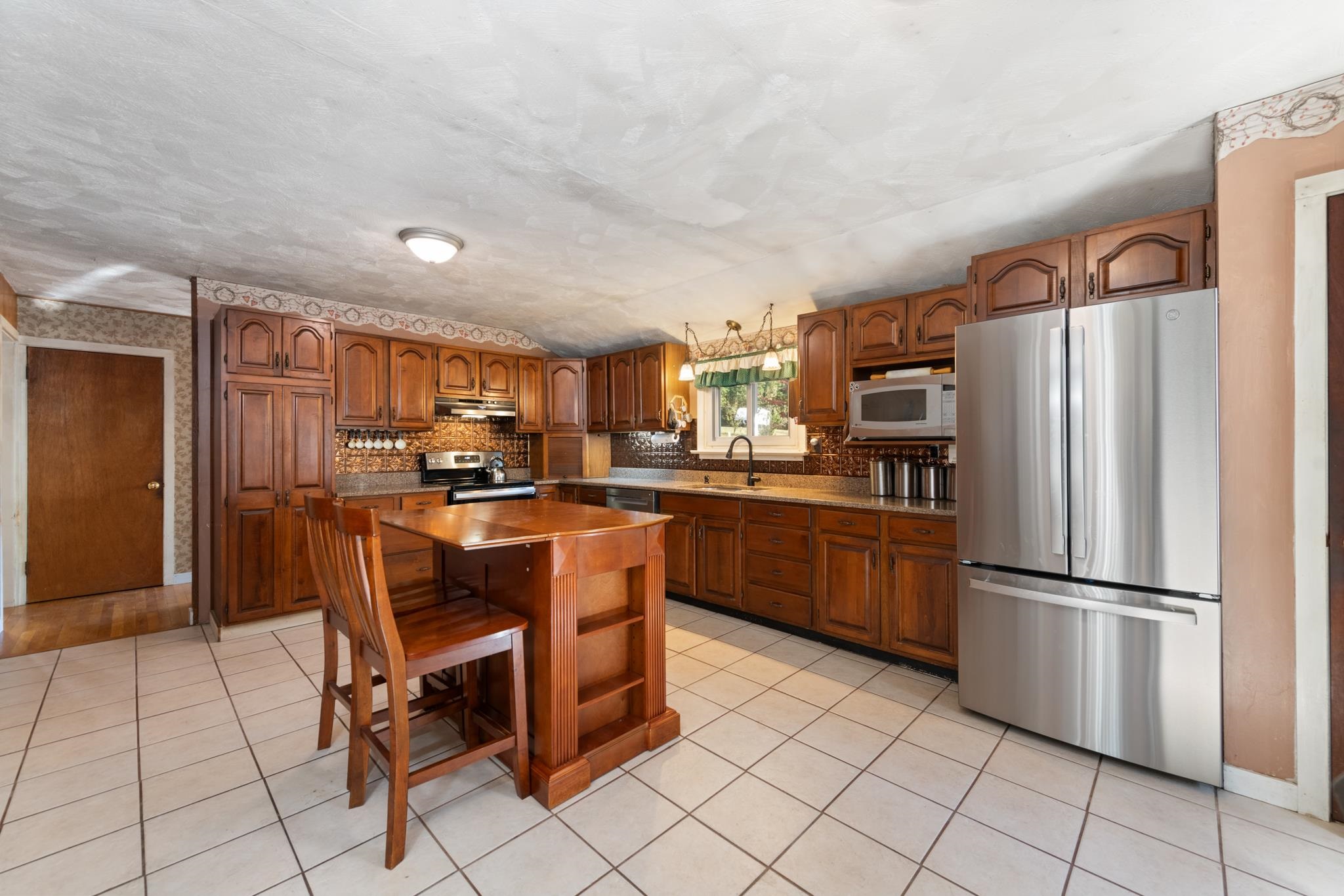 with brand new stainless steel appliances