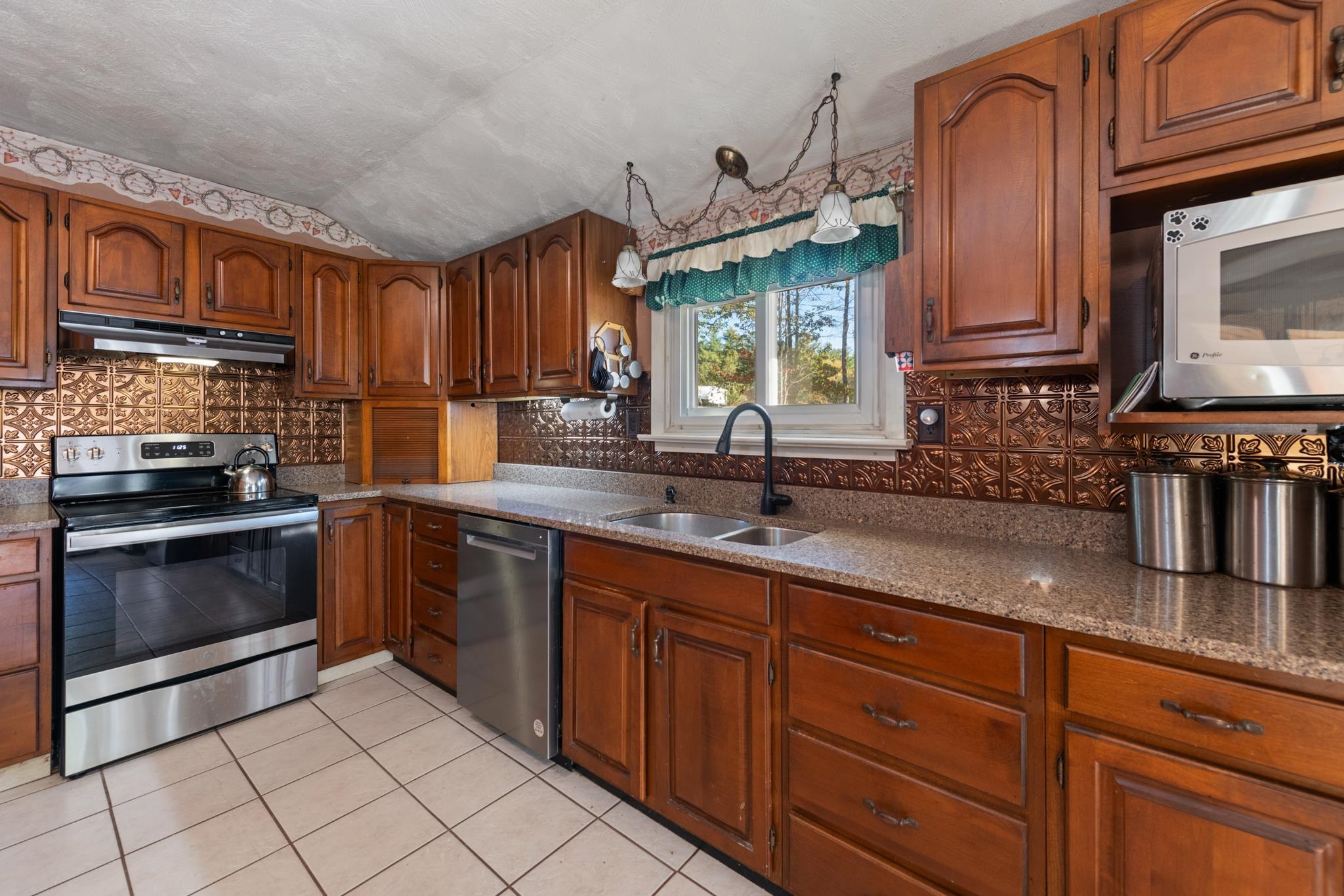 stone counter tops & dark wood cabinetry