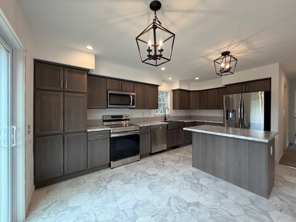 Applianced Kitchen 24275296